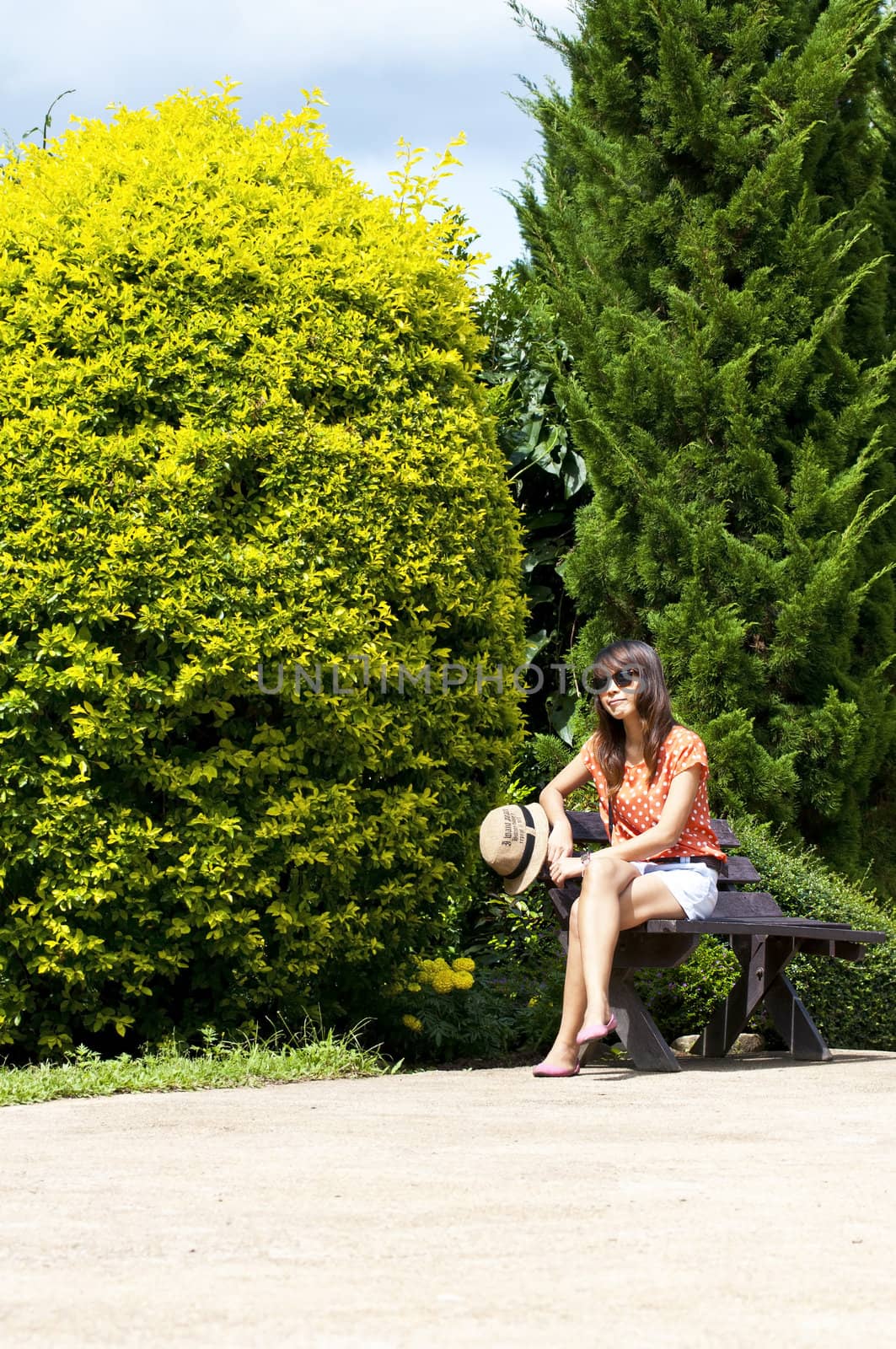 Portrait Of Asian Young Woman In garden by Yuri2012