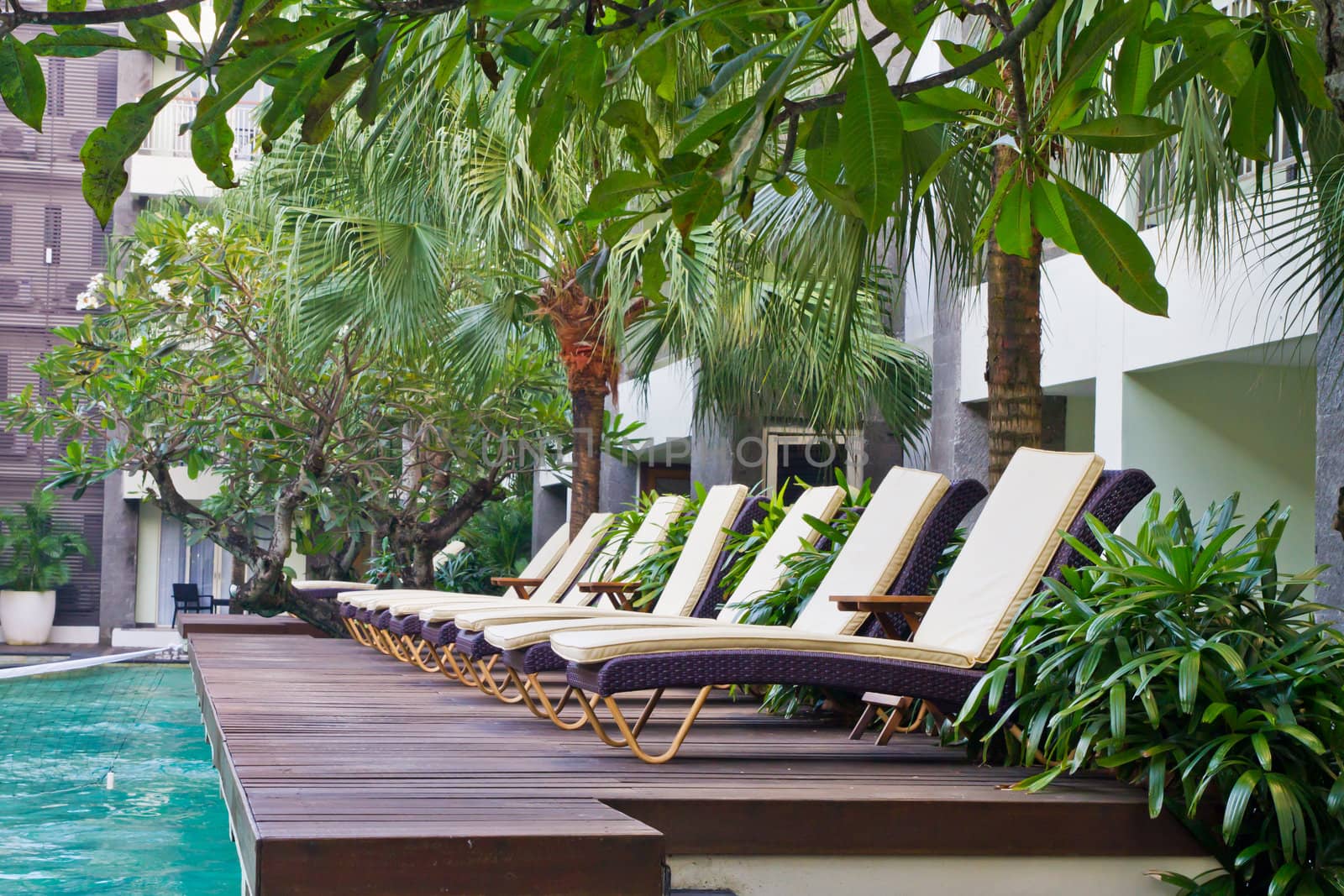 Spa chair on wooden pool deck