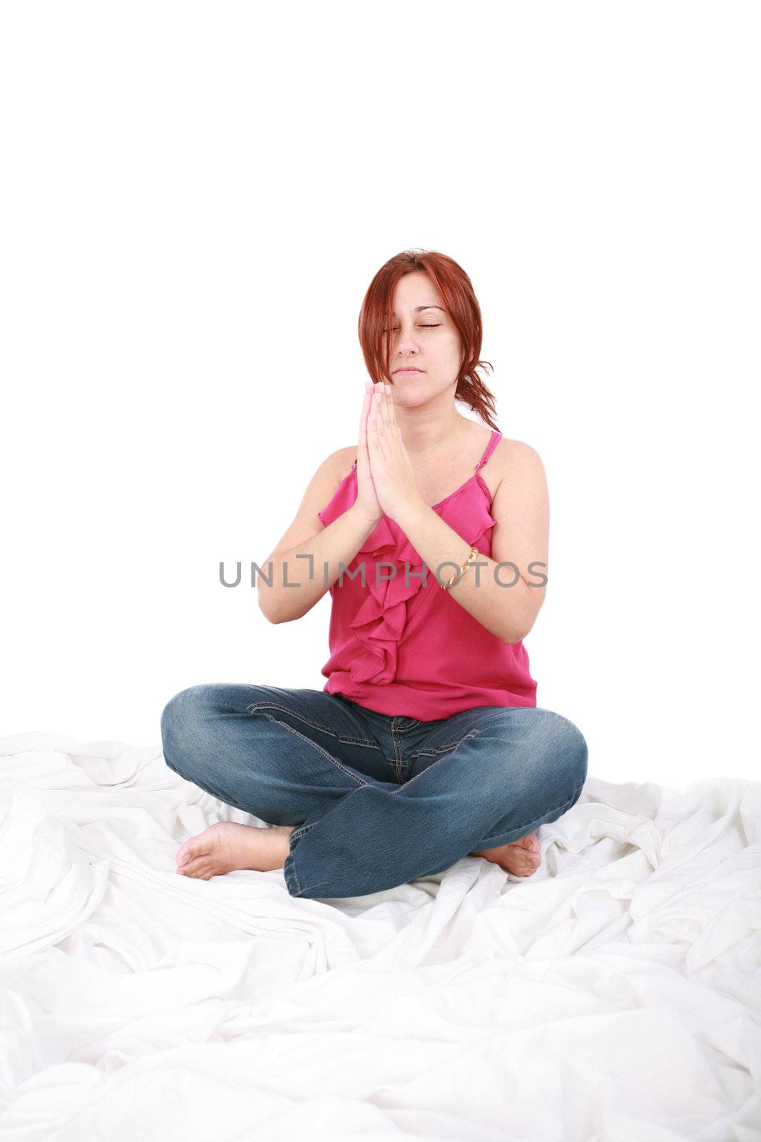 young woman spending yogatic time by herself in the bedroom with copyspace