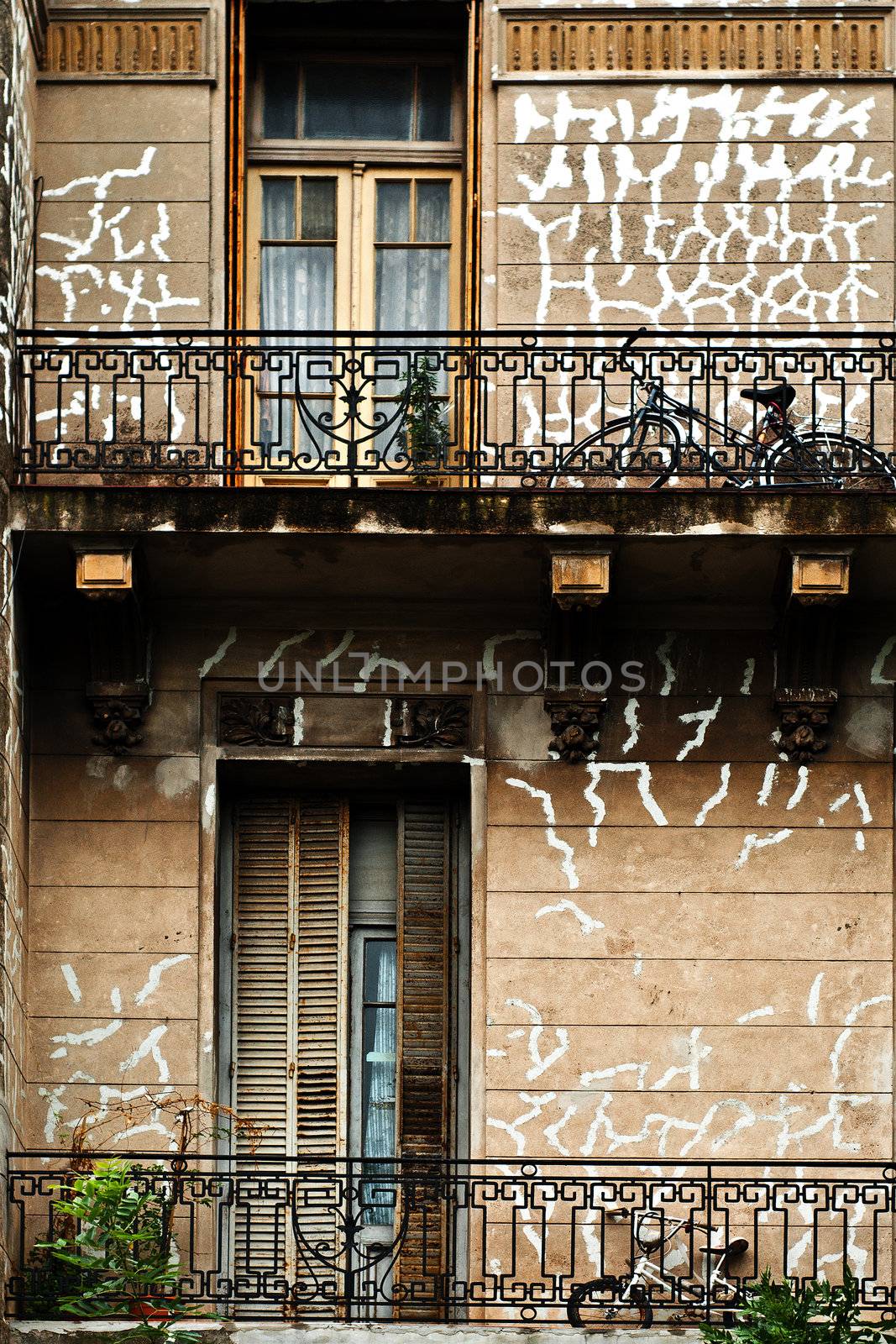 Bicycles sitting on old dilapidated balconies in Buenos Aires, Argentina.