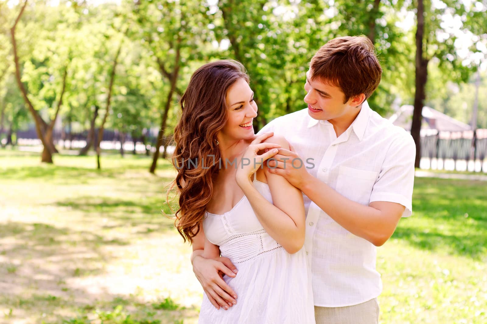 couple hugging in the park, have a good time together