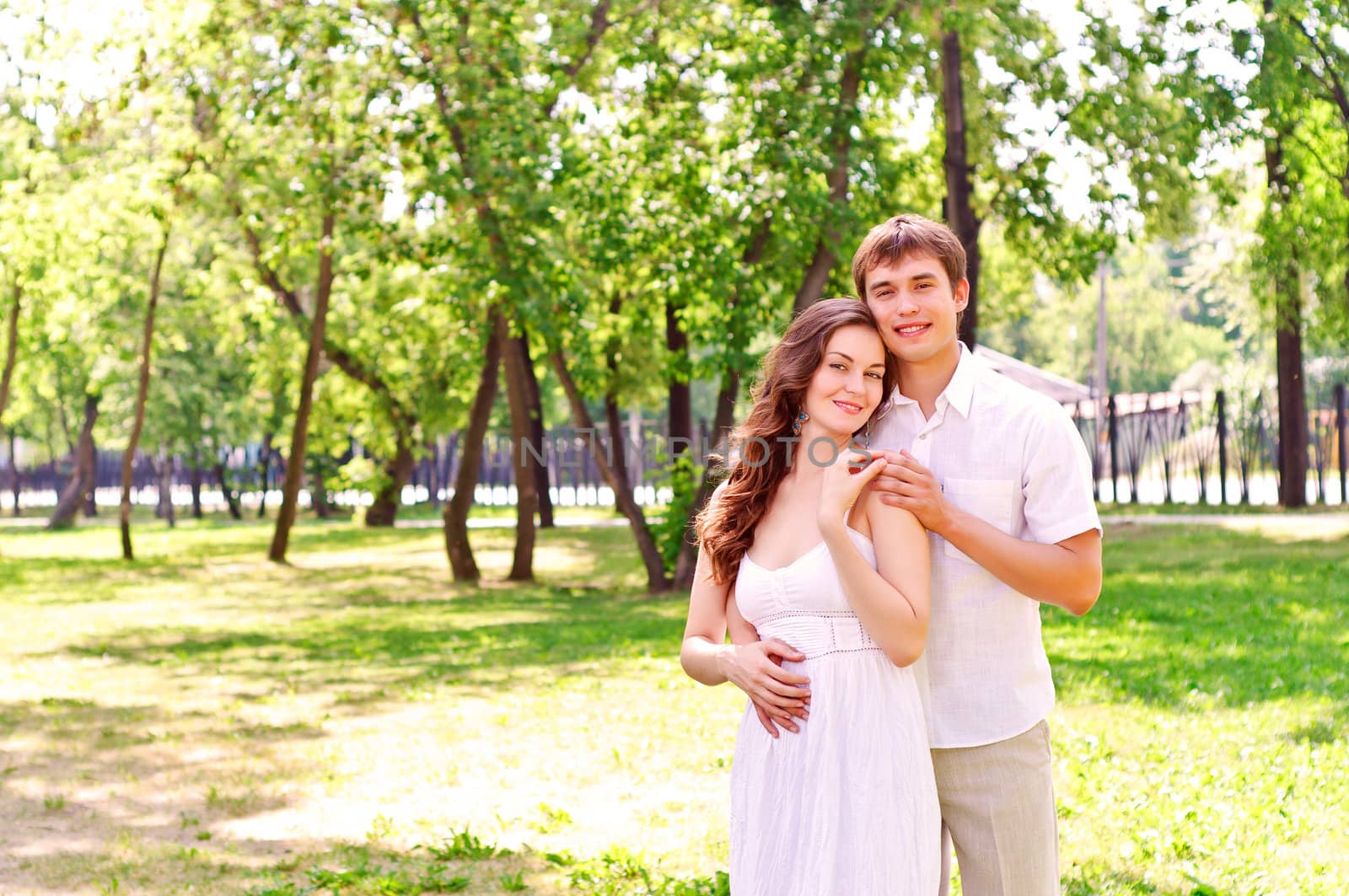 couple hugging in the park, have a good time together