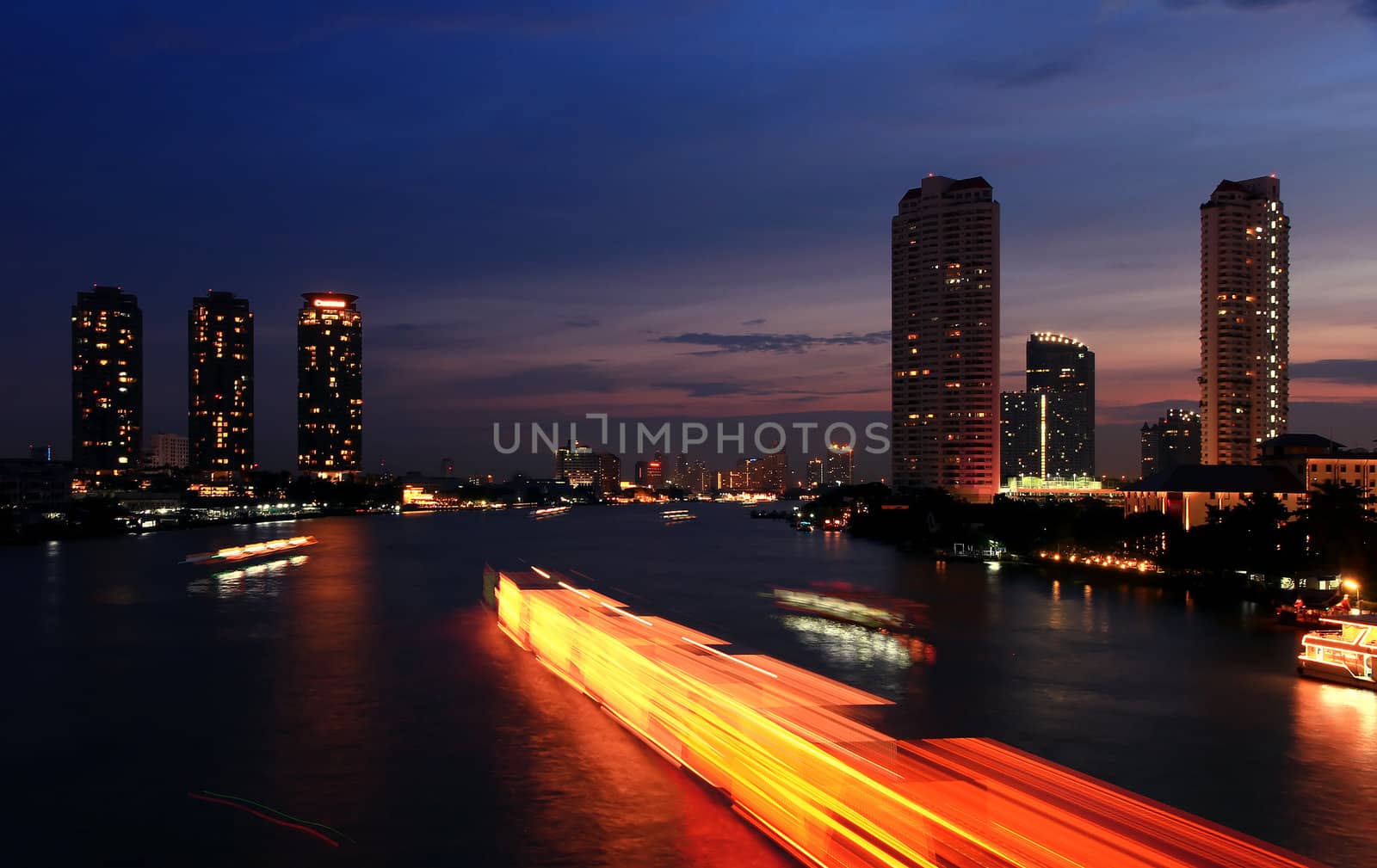 The light from the tallest building in the city and the river. Beautiful views of Bangkok Thailand.