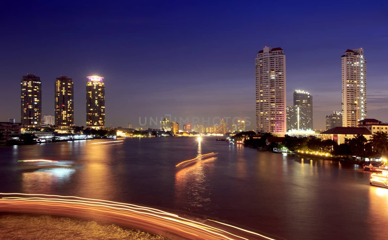 The light from the tallest building in the city and the river. Beautiful views of Bangkok Thailand.