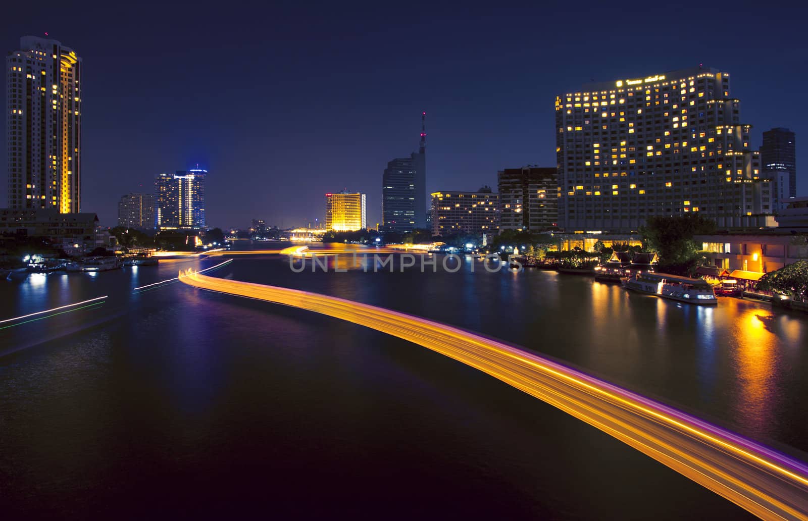 The light from the tallest building in the city and the river. Beautiful views of Bangkok Thailand.