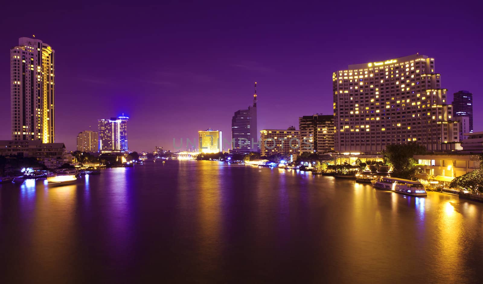 The light from the tallest building in the city and the river. Beautiful views of Bangkok Thailand.