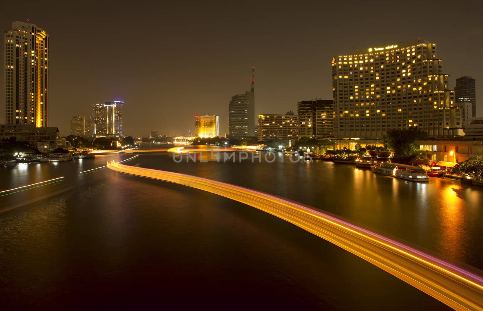 The light from the tallest building in the city and the river. Beautiful views of Bangkok Thailand.