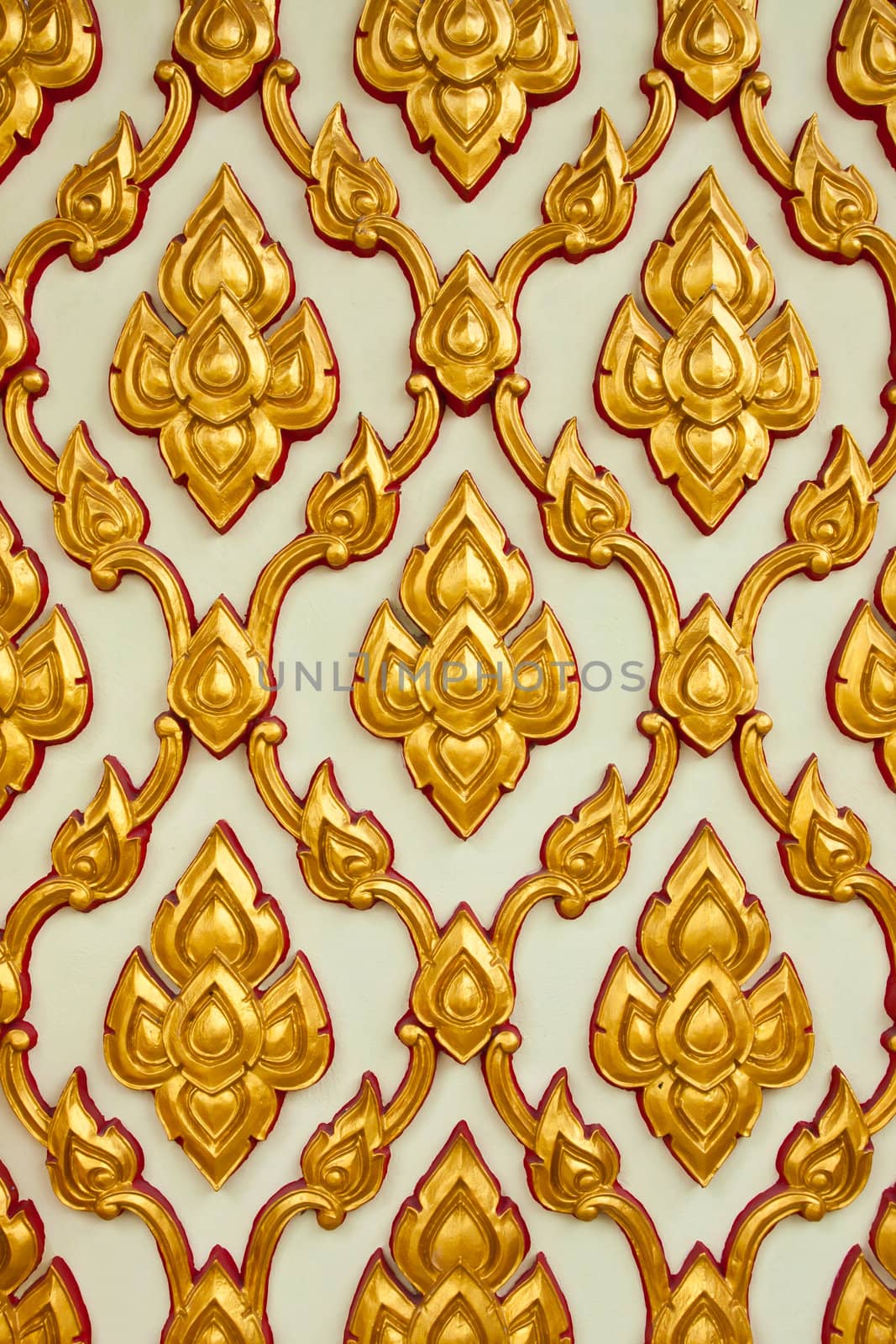 Thai style art texture on white temple wall