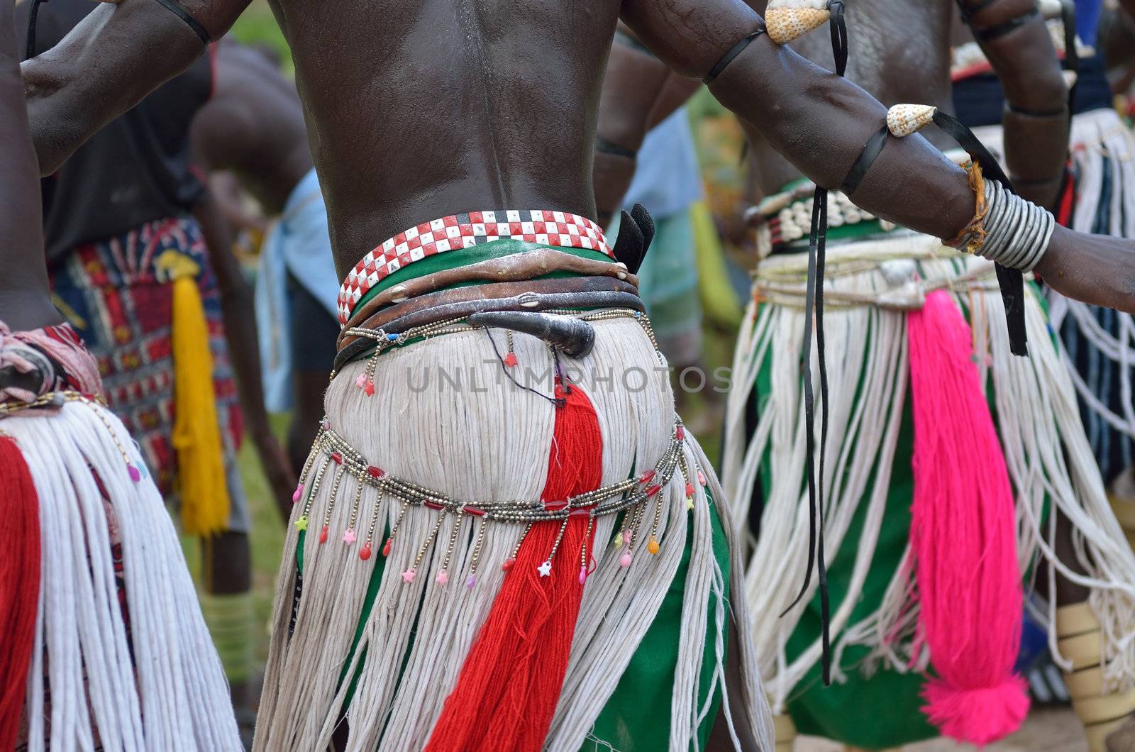 African men perform in a tribal dance
