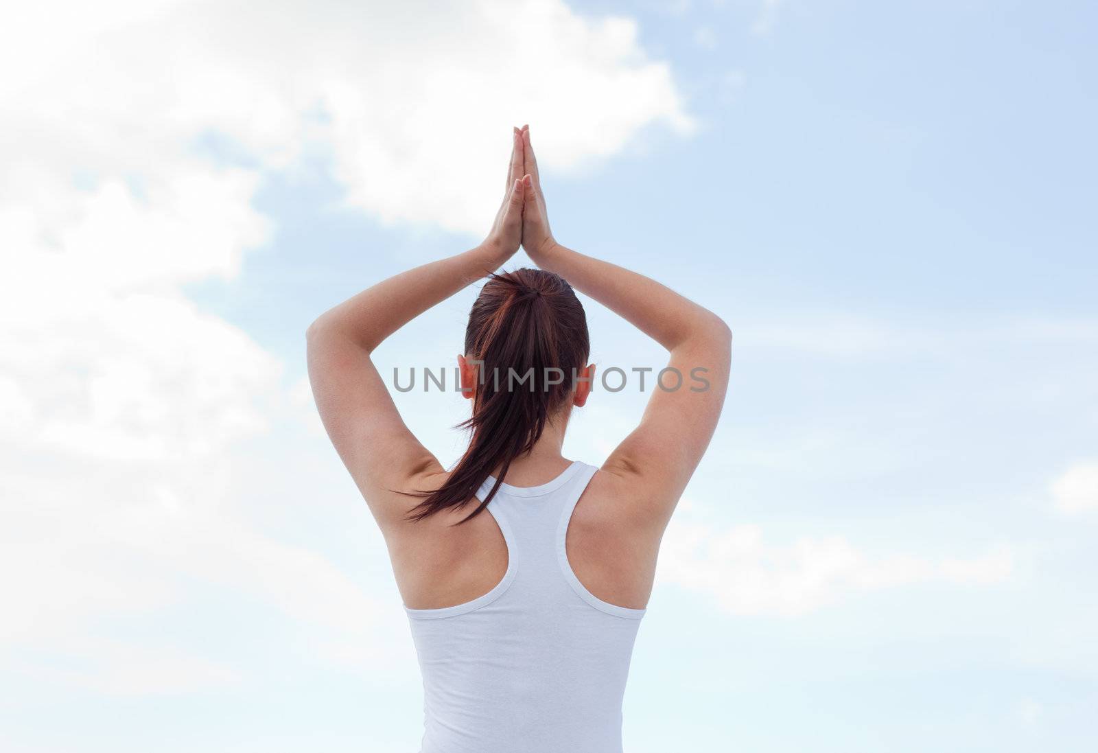 Young attractive woman doing yoga 