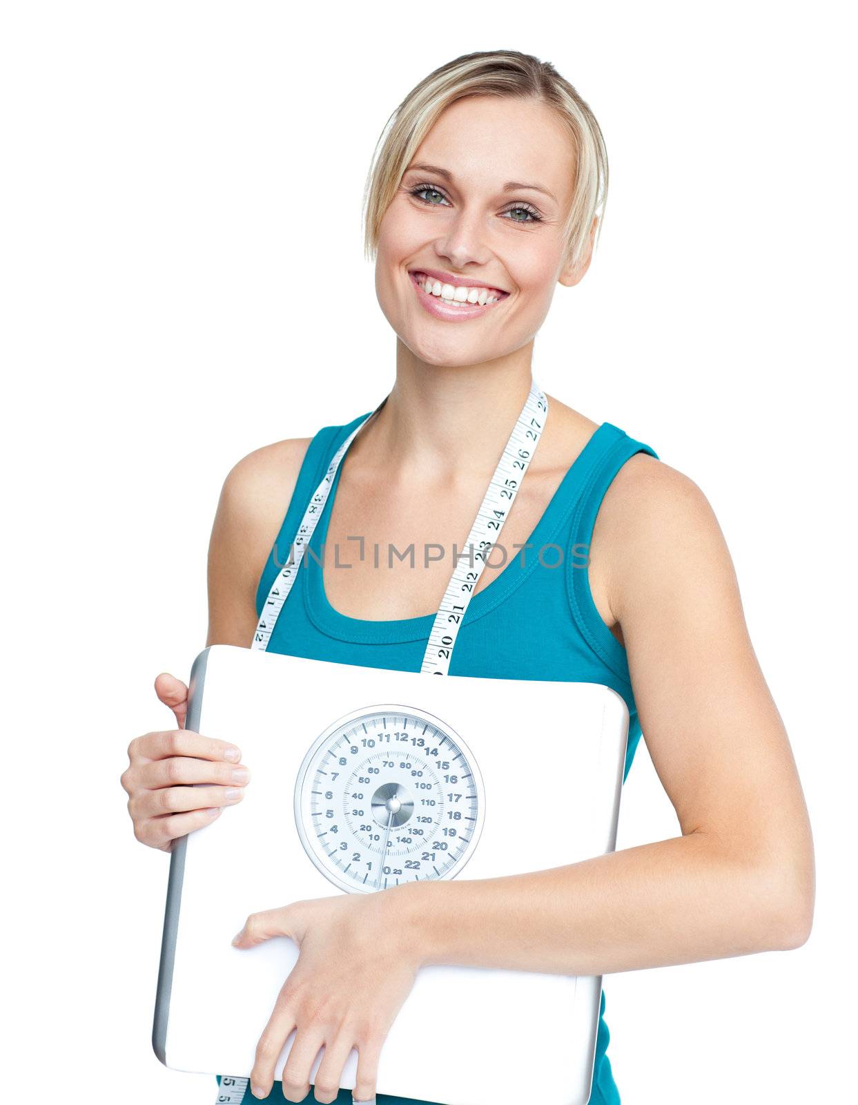 Caucasian young woman holding a weight scale by Wavebreakmedia