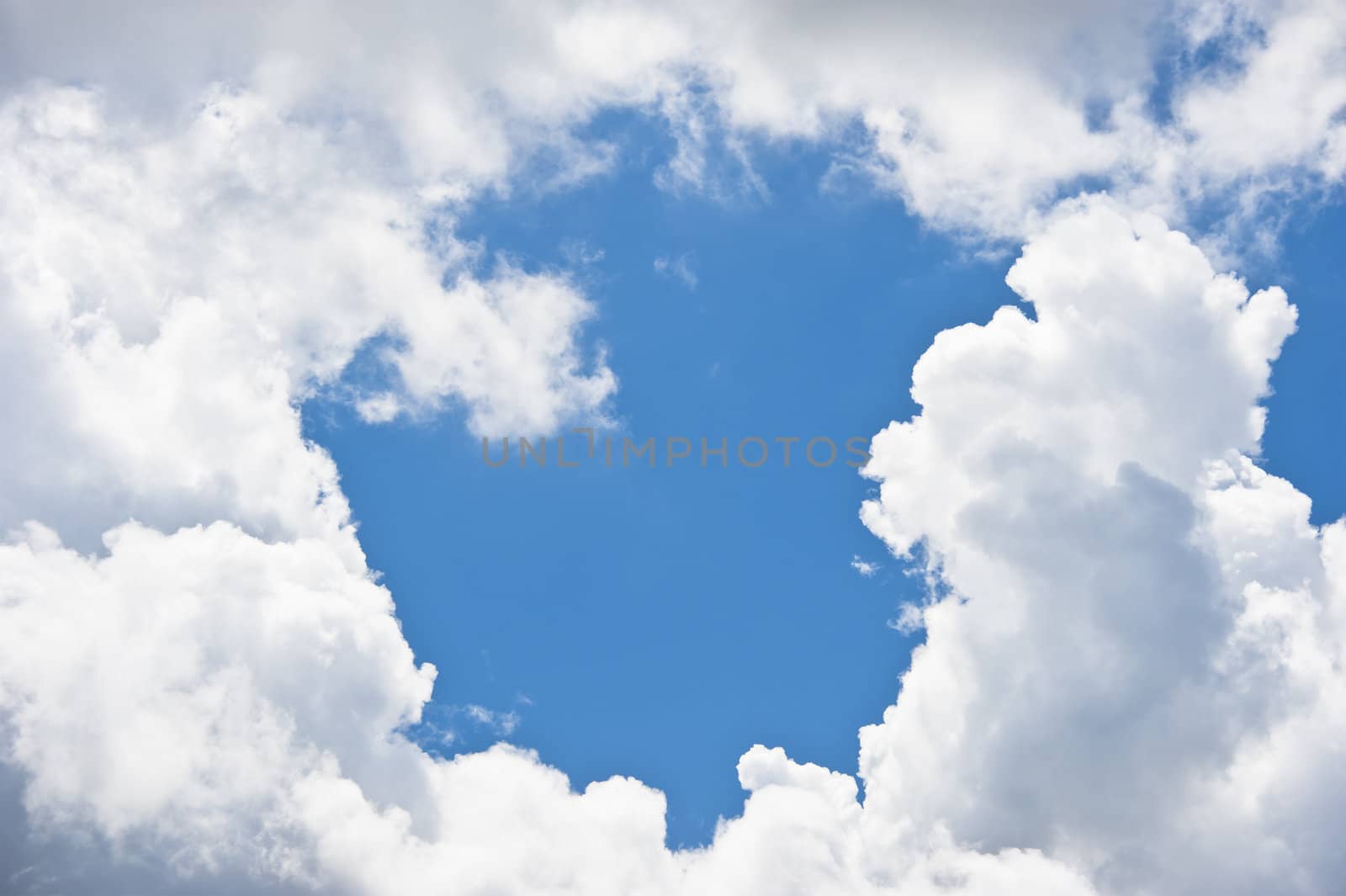 Clouds and clear blue sky background