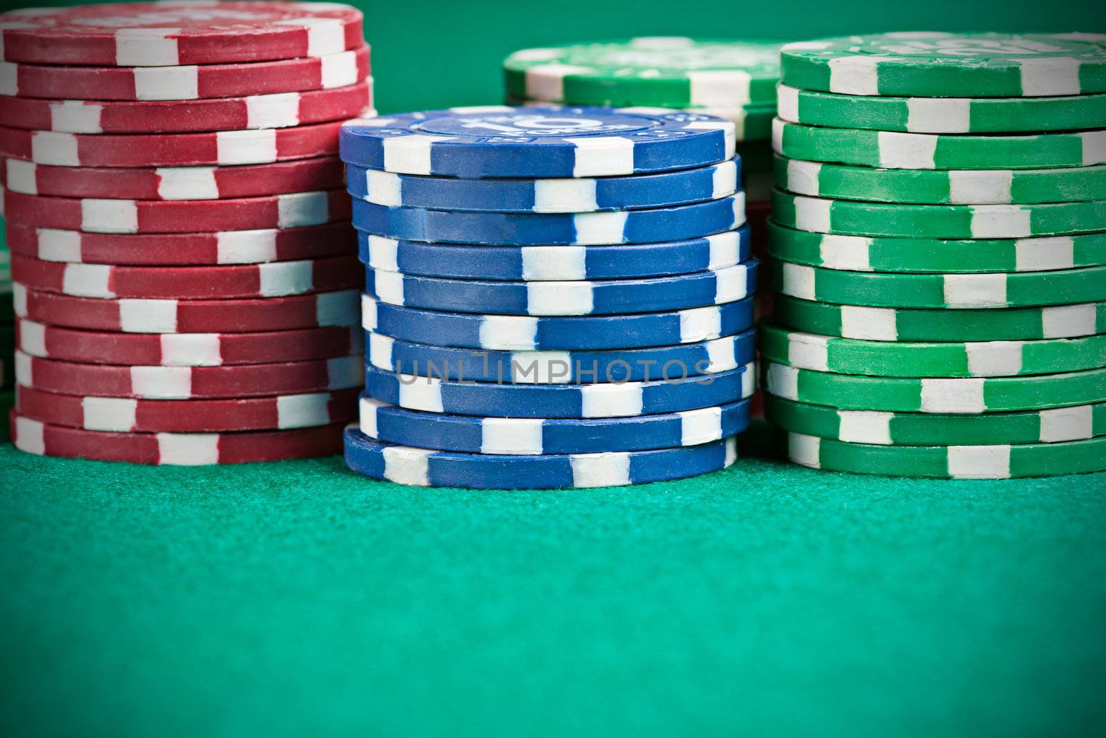 Pile of poker chips on a poker table