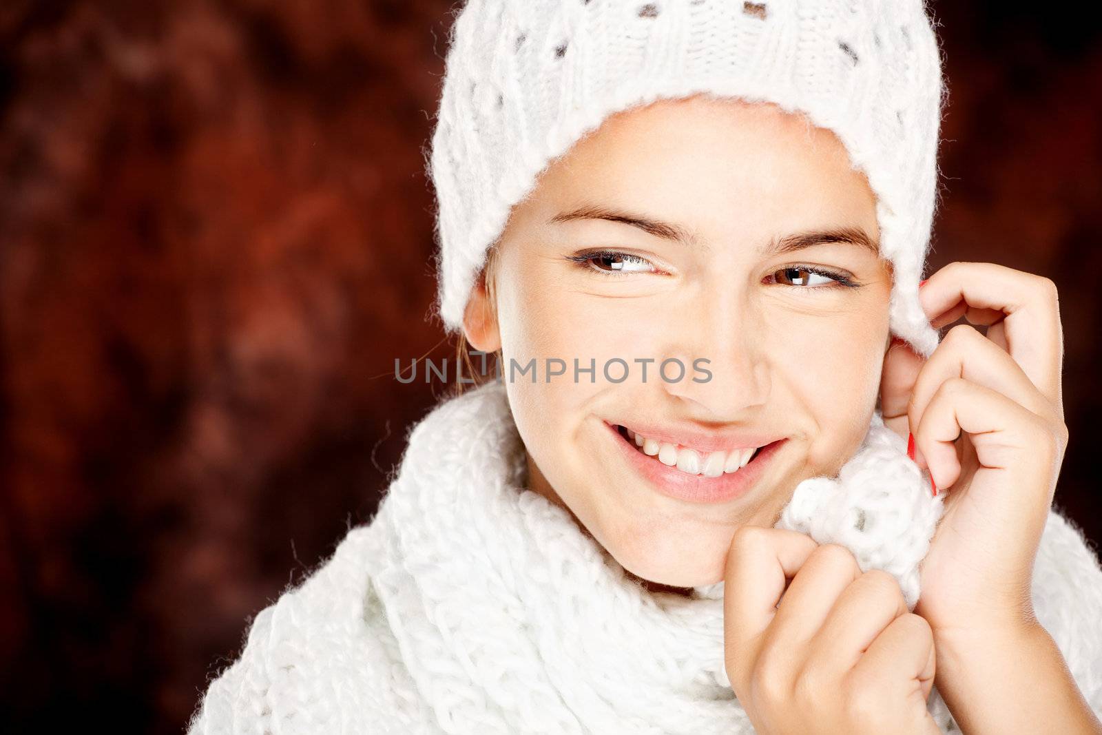 woman in wool sweater and cap by imarin