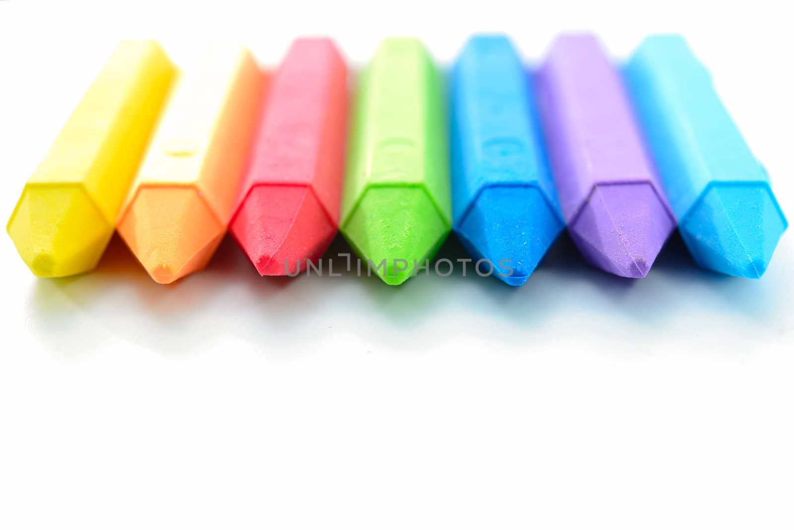 colorful eraser on white background by moggara12