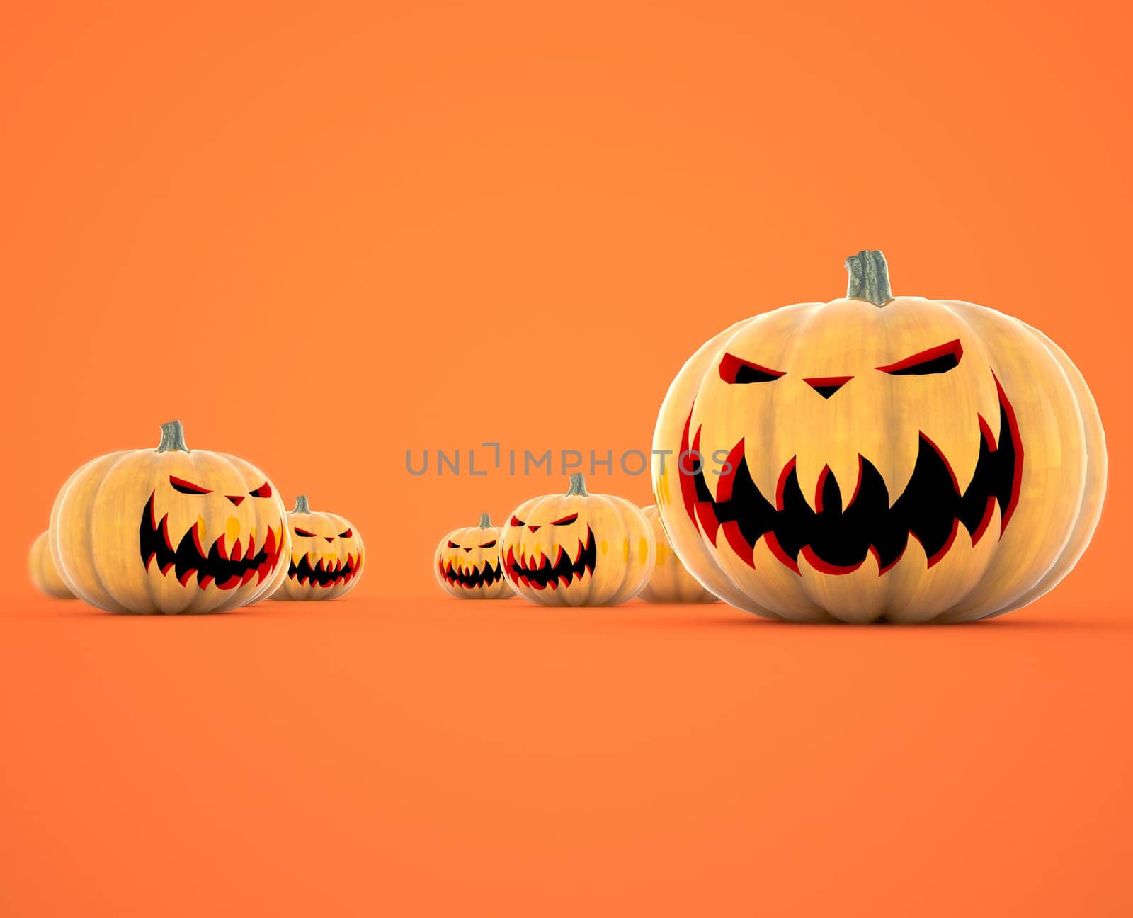 Halloween pumpkins isolated on orange background