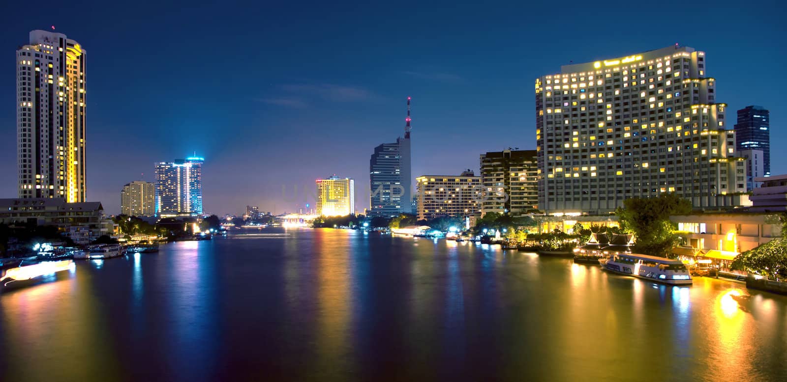 The light from the tallest building in the city and the river. Beautiful views of Bangkok Thailand.