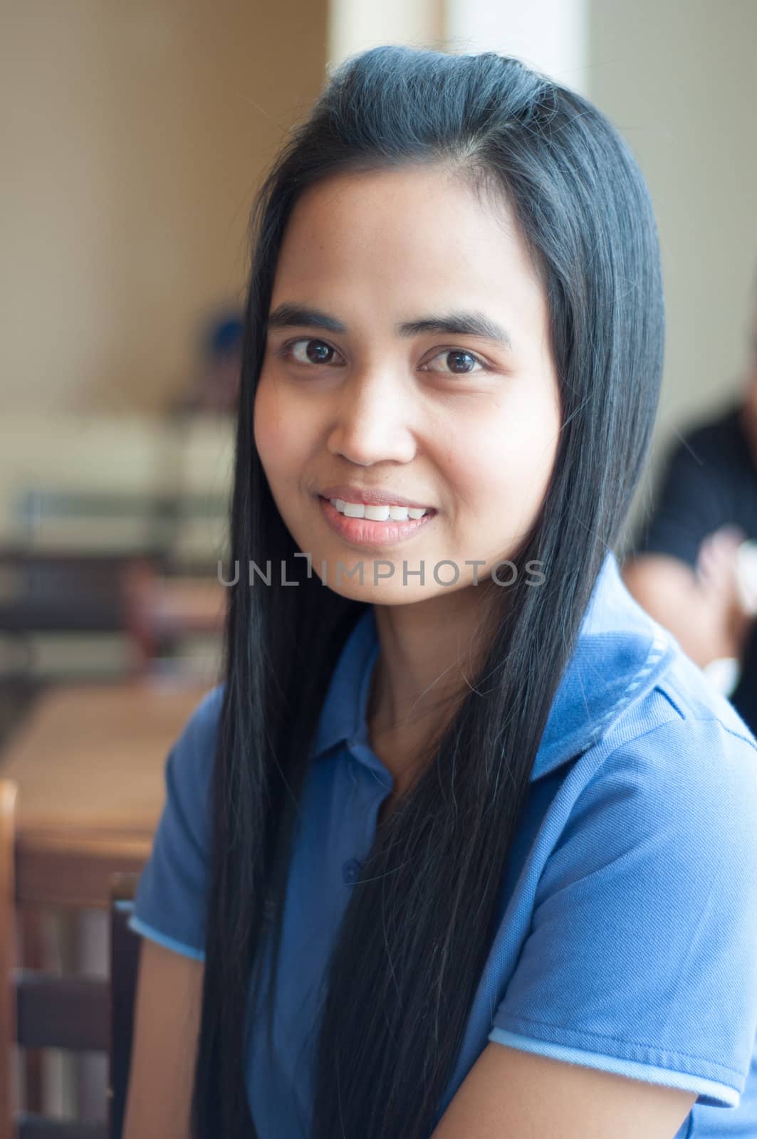 asian thai woman portrait in blue shirt by ngarare