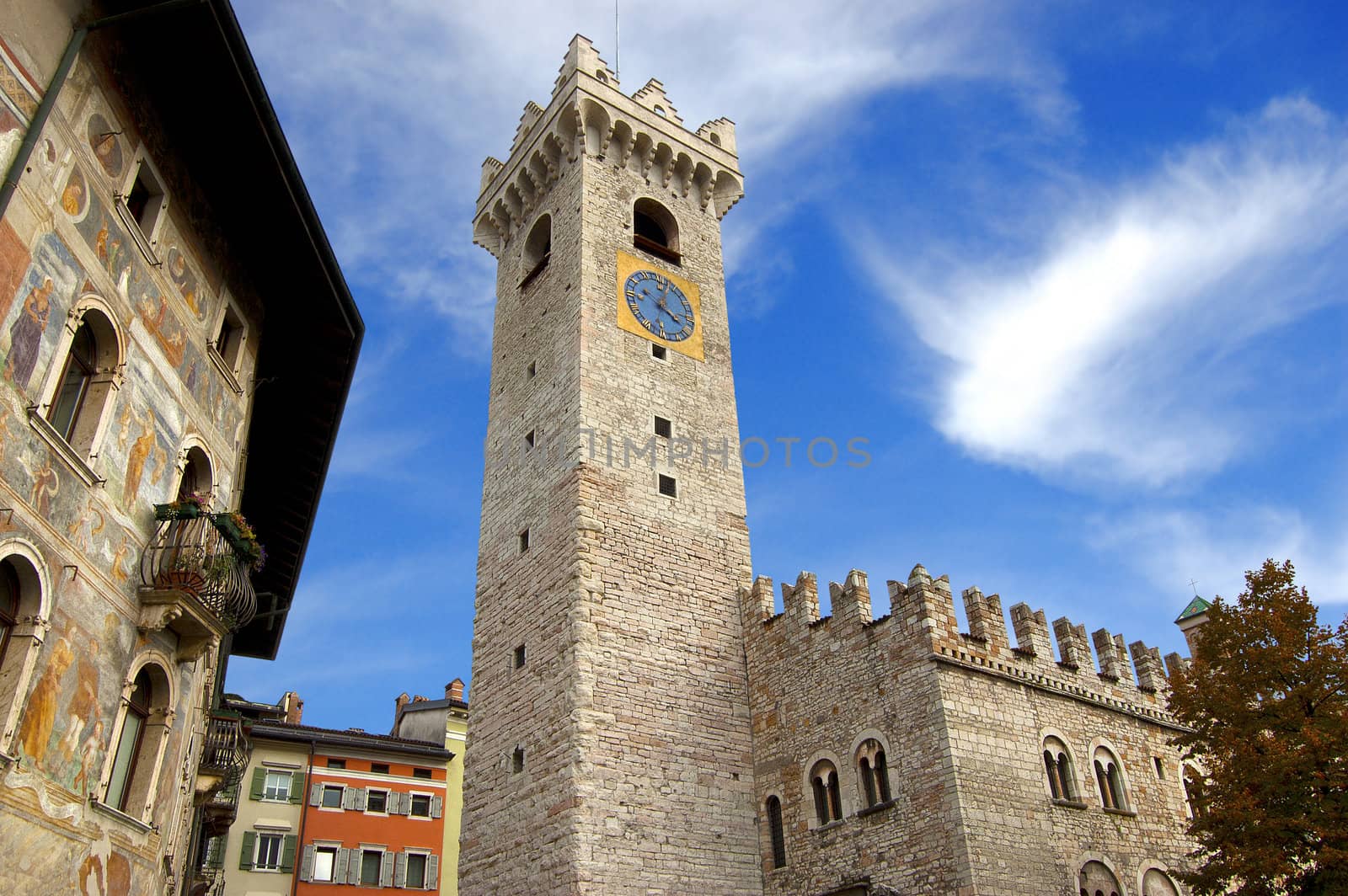 Praetorian Palace, Civic Tower and frescoes in the cathedral square in Trento - Italy
