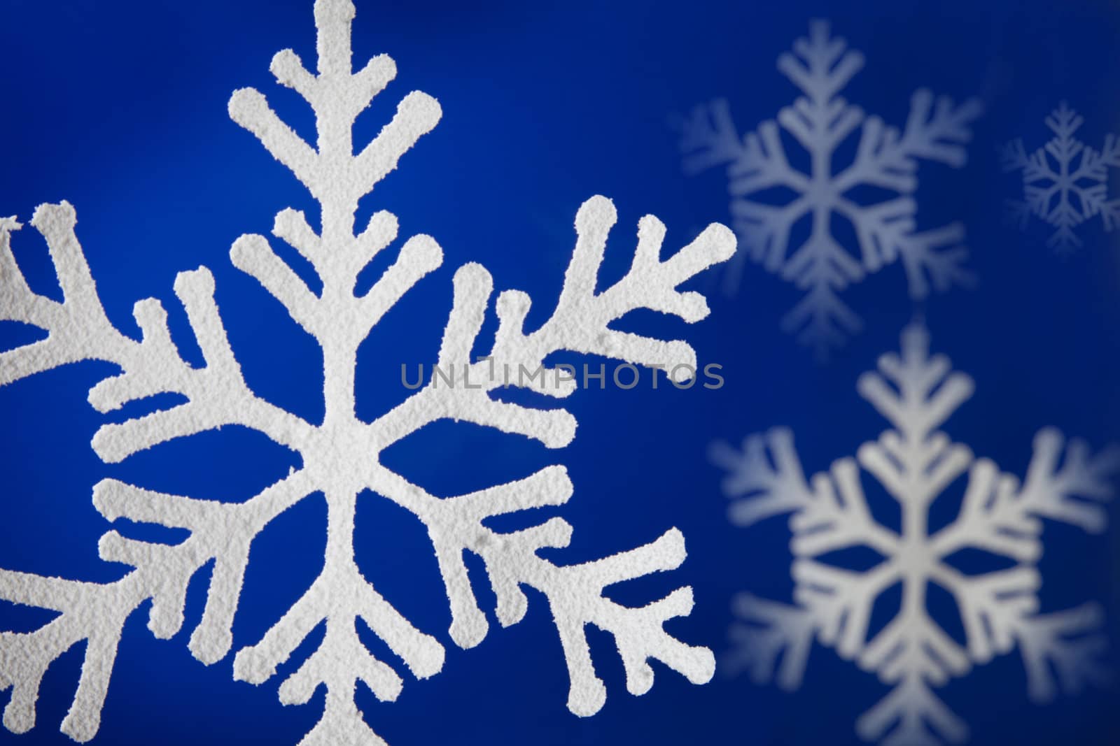 Blue background with snow flakes.