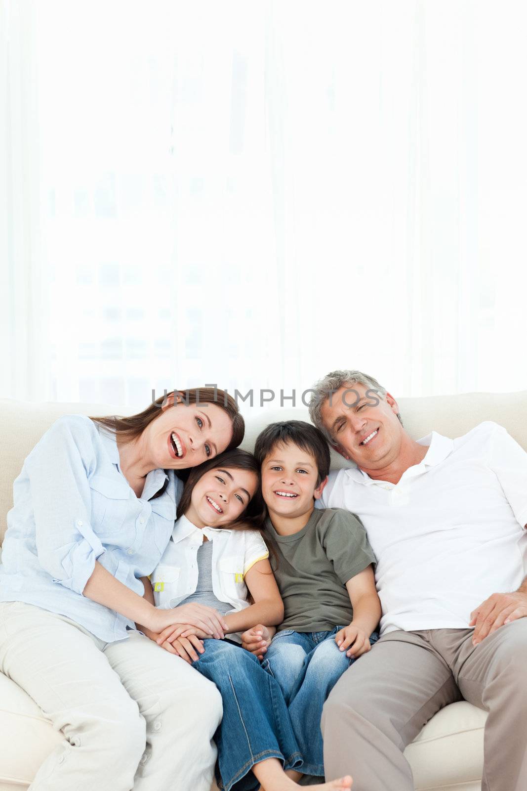 Portrait of a smiling family at home