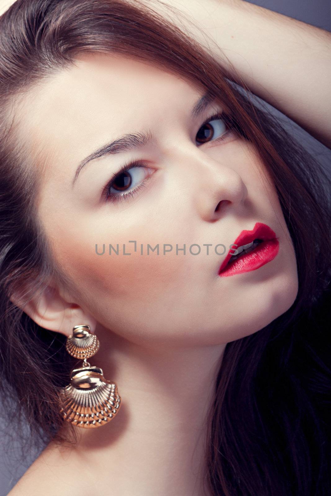 fashion woman with red lips close-up split toning