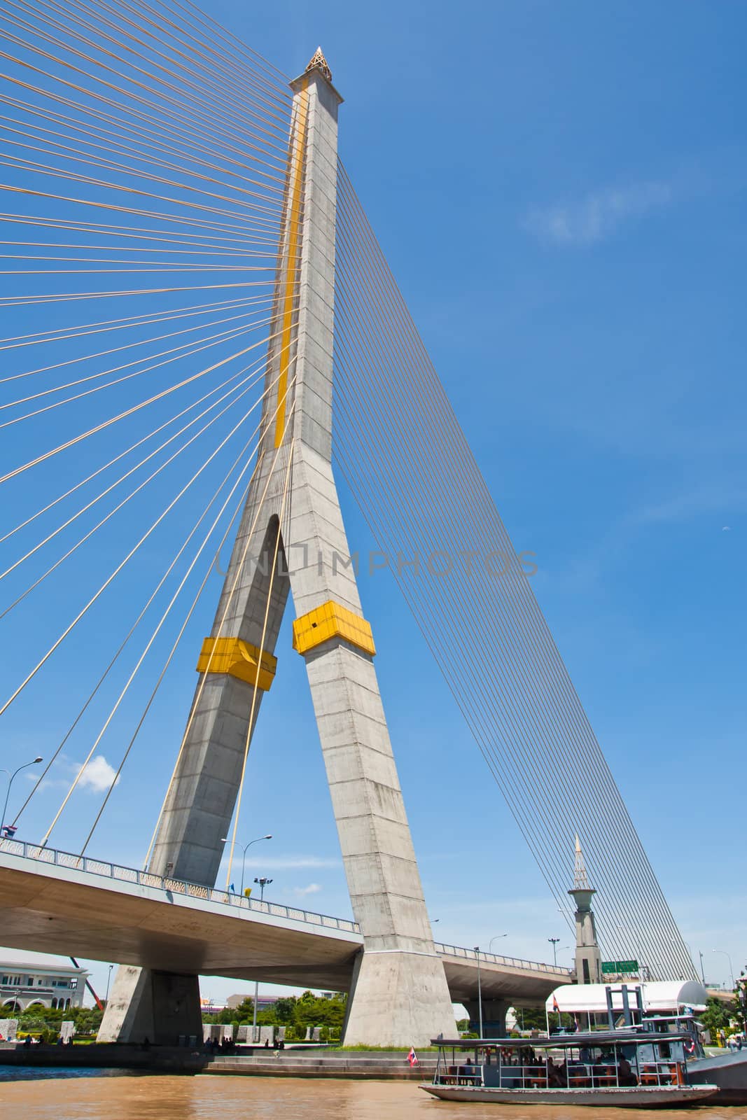 Big cable bridge against blue sky by ta_khum
