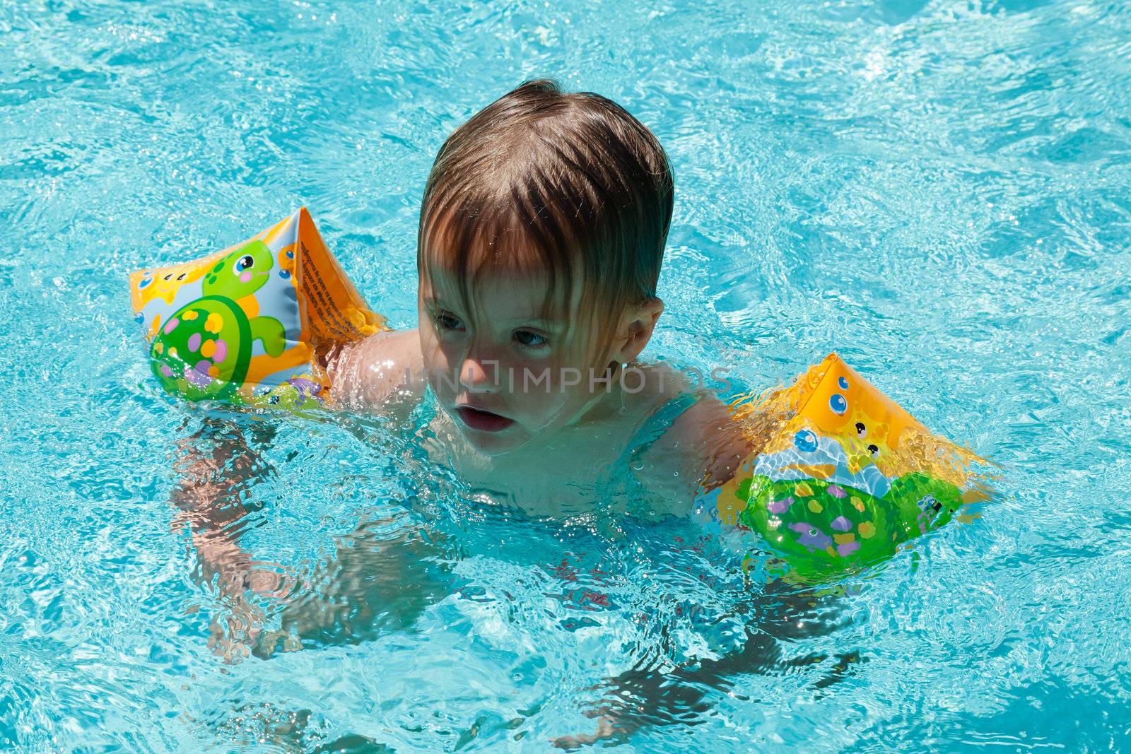 Having fun in water on hot summer day.