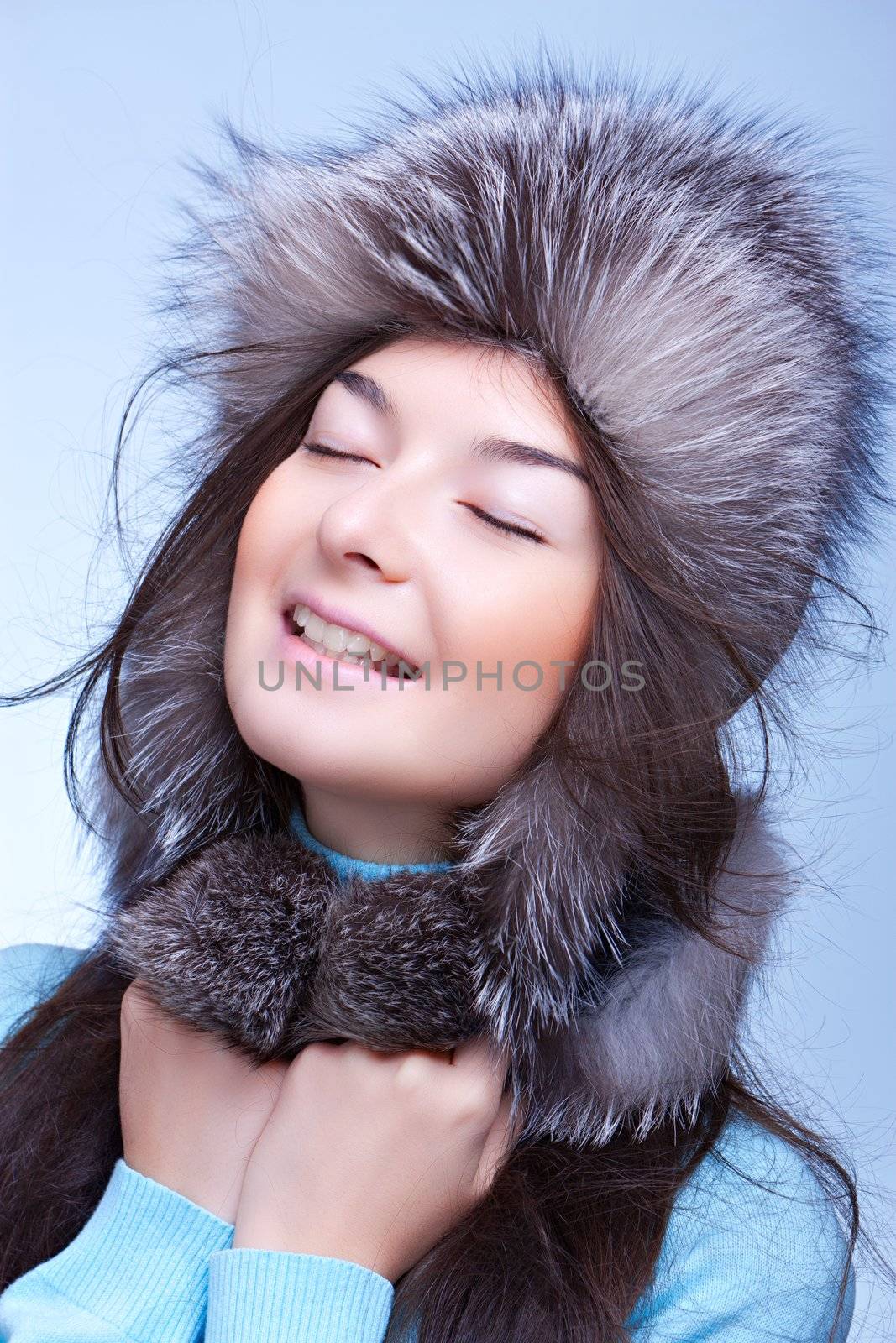 happy woman in fur cap by nigerfoxy