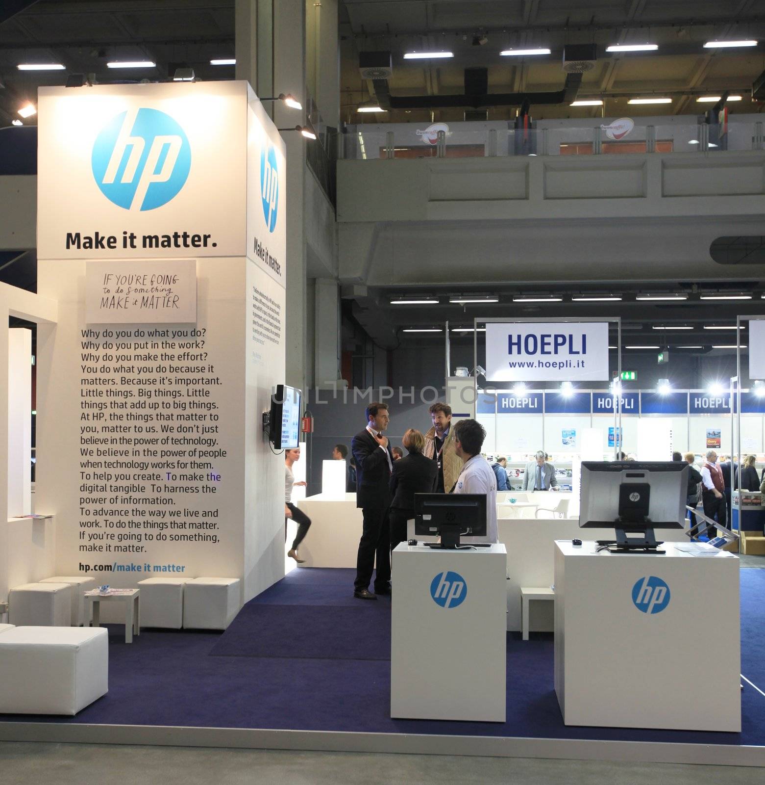 MILAN, ITALY - OCTOBER 17: People visit HP technologies products exhibition area at SMAU, international fair of business intelligence and information technology October 17, 2012 in Milan, Italy.