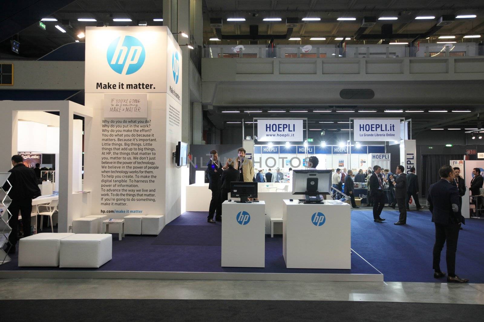 MILAN, ITALY - OCTOBER 17: People visit HP technologies products exhibition area at SMAU, international fair of business intelligence and information technology October 17, 2012 in Milan, Italy.