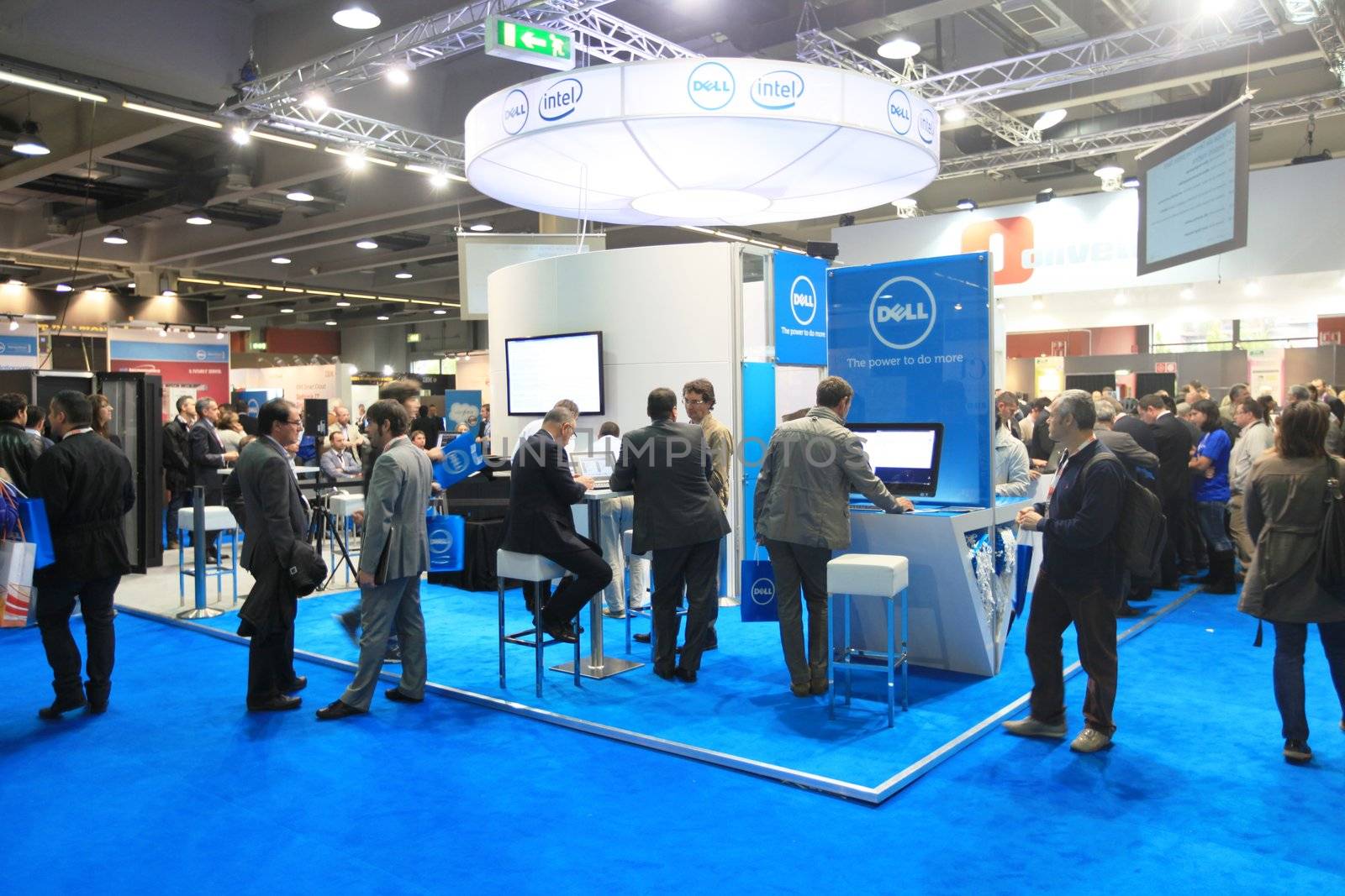 MILAN, ITALY - OCTOBER 17: People visit Intel technologies products exhibition area at SMAU, international fair of business intelligence and information technology October 17, 2012 in Milan, Italy.