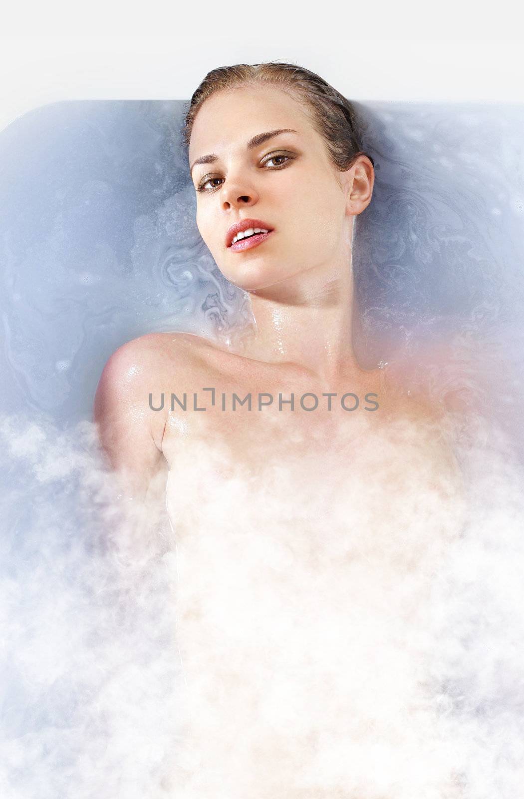 woman in hot bathtab by ssuaphoto