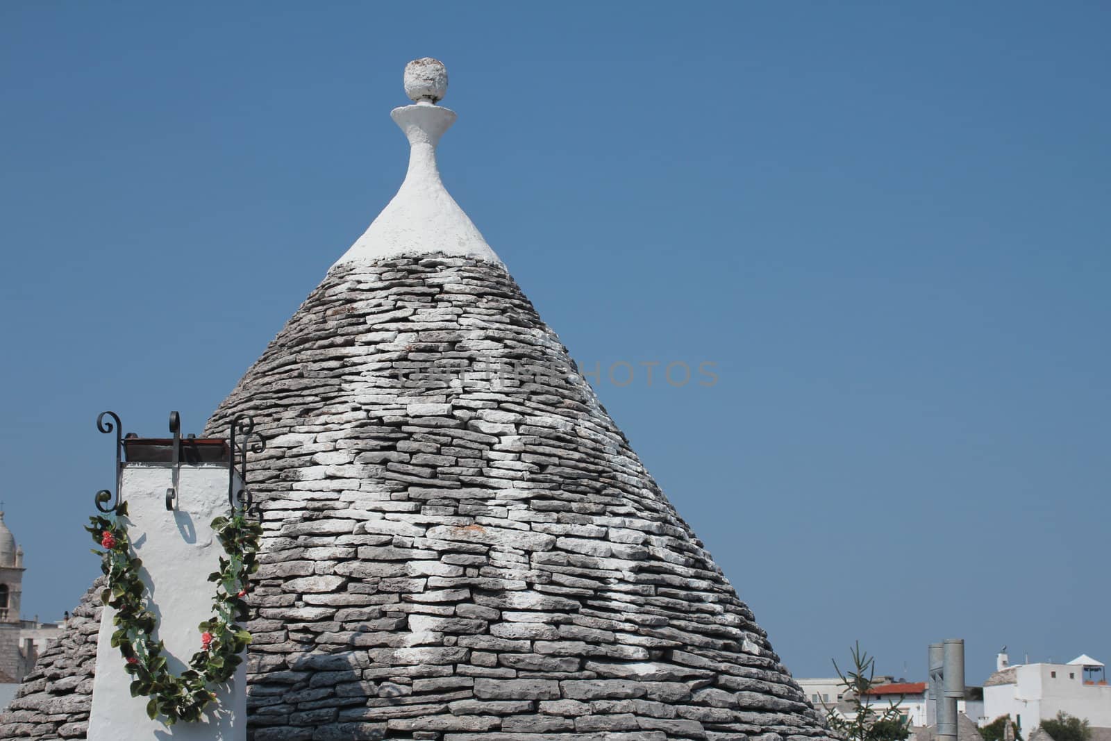 Roof of a trullo, a traditional apulian dry stone hut, typical a specific part of the south of Italy
