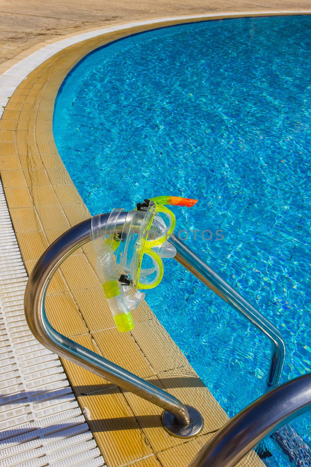 Mask and snorkel for diving near the pool by oleg_zhukov