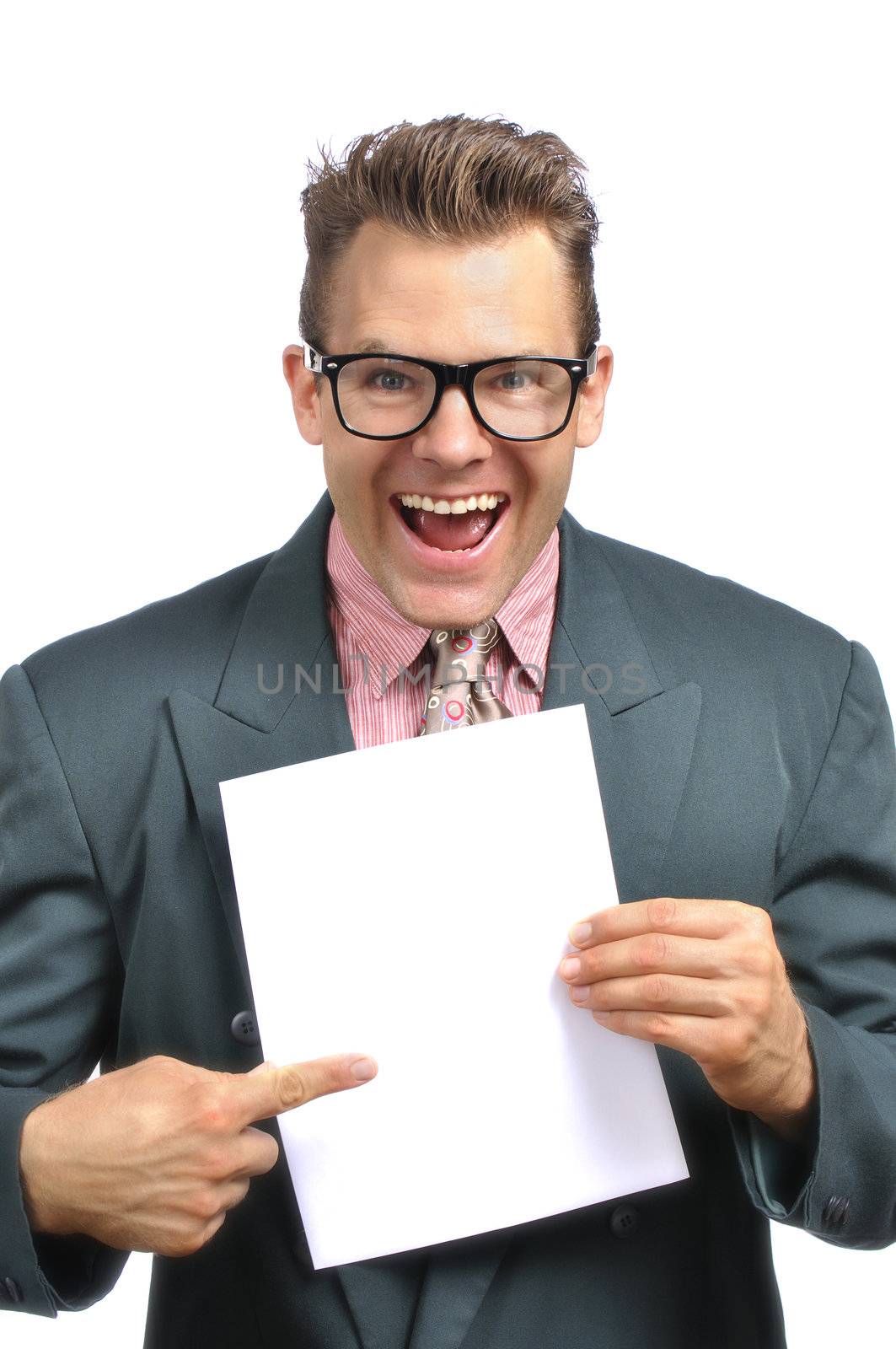 Eccentric excited businessman in fashionable suit shows off paper he is holding