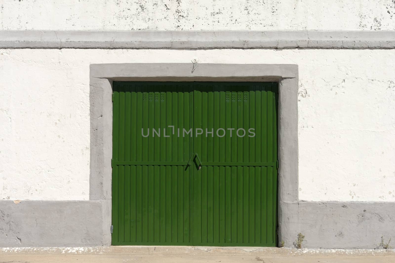 Bright green old wareouse door