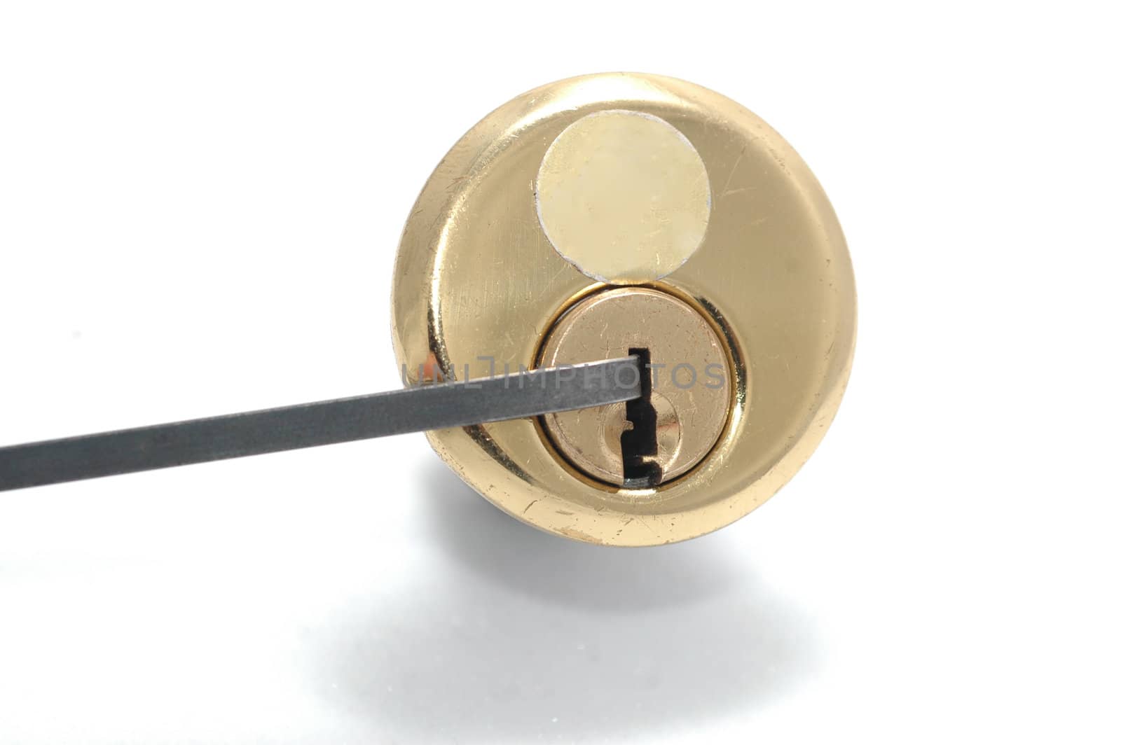 Picking a pin-tumbler lock with a tension wrench