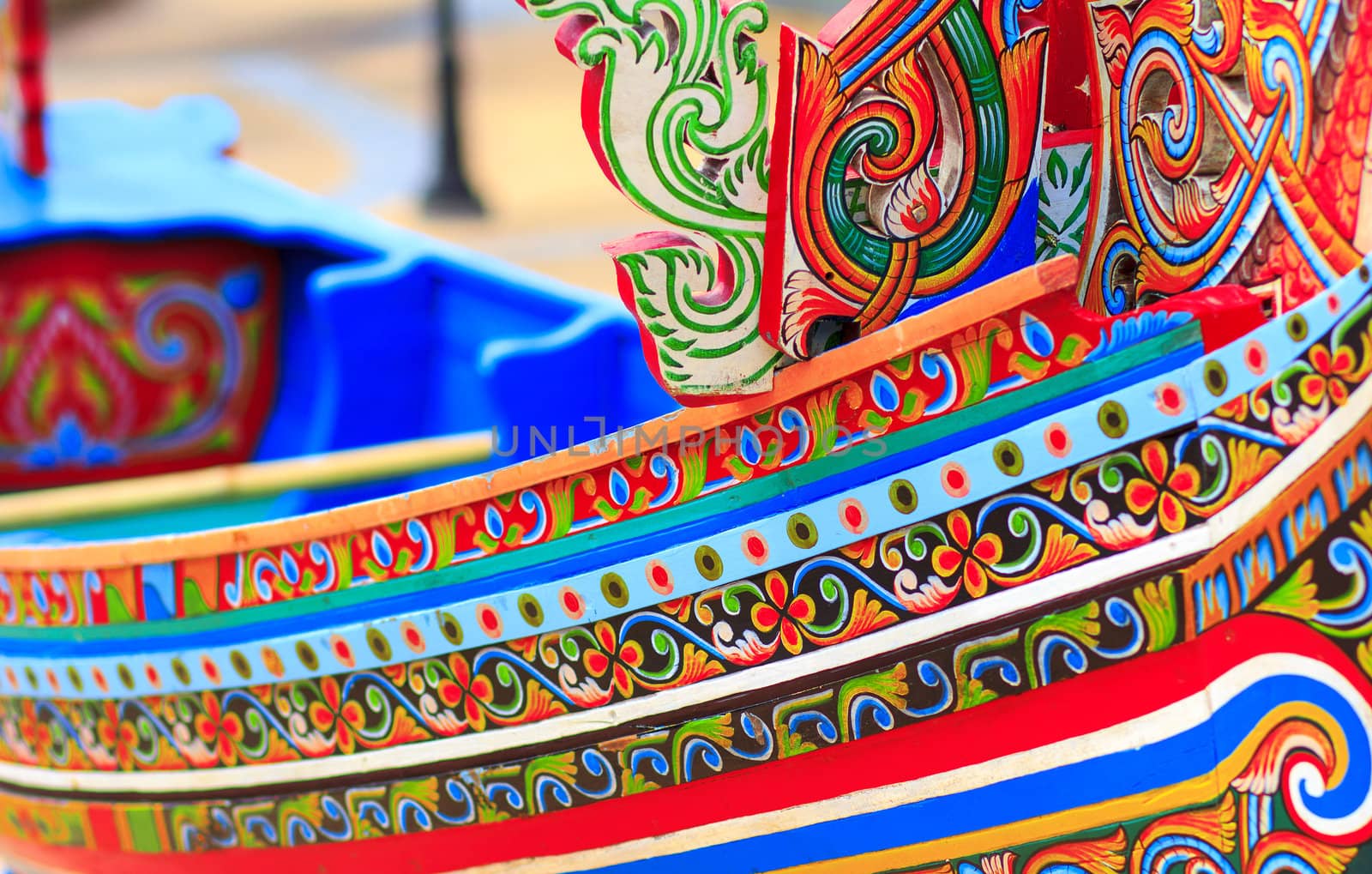 Colorful pattern of traditional fisherman boats These wooden boats were made and painted by boat makers in south of Thailand.