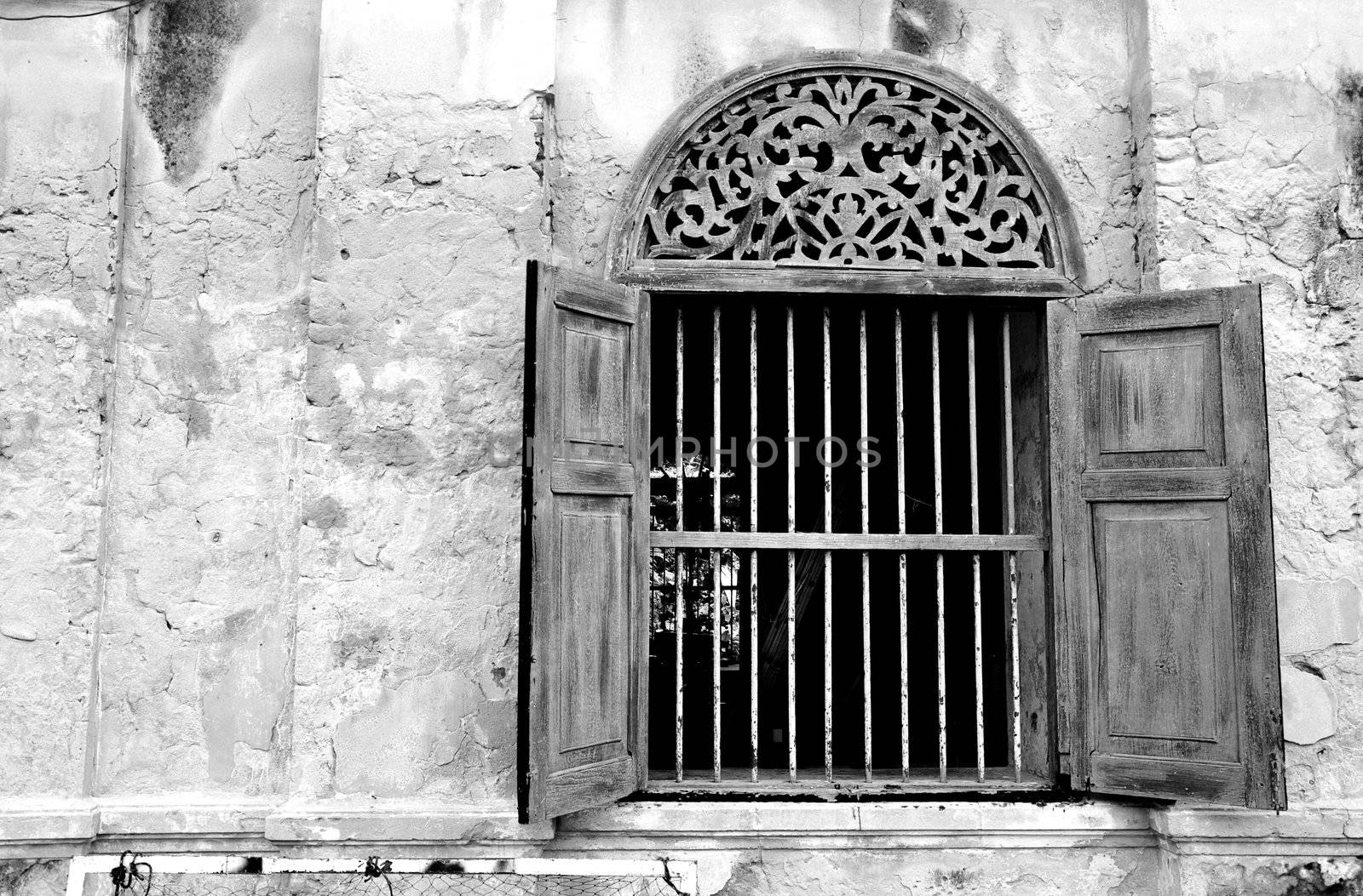 Old style wall and widow with carve, black and white processing