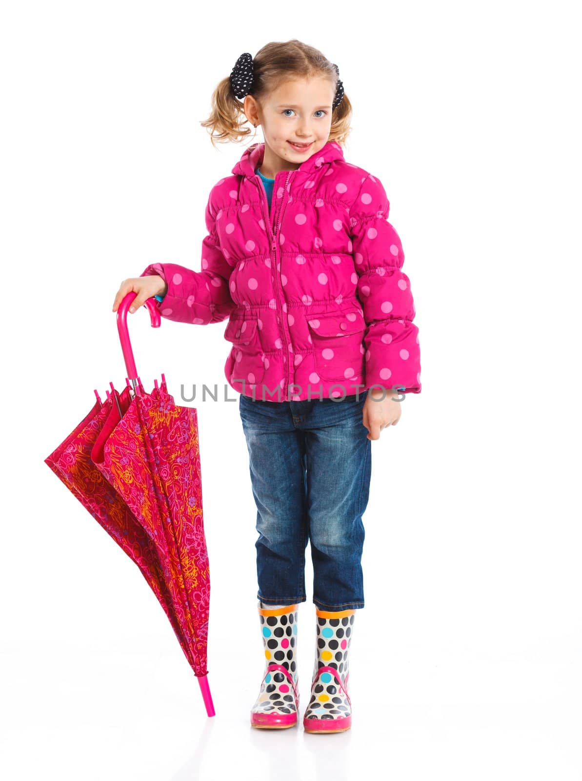 Beautiful little girl with umbrella. Isolated on white background