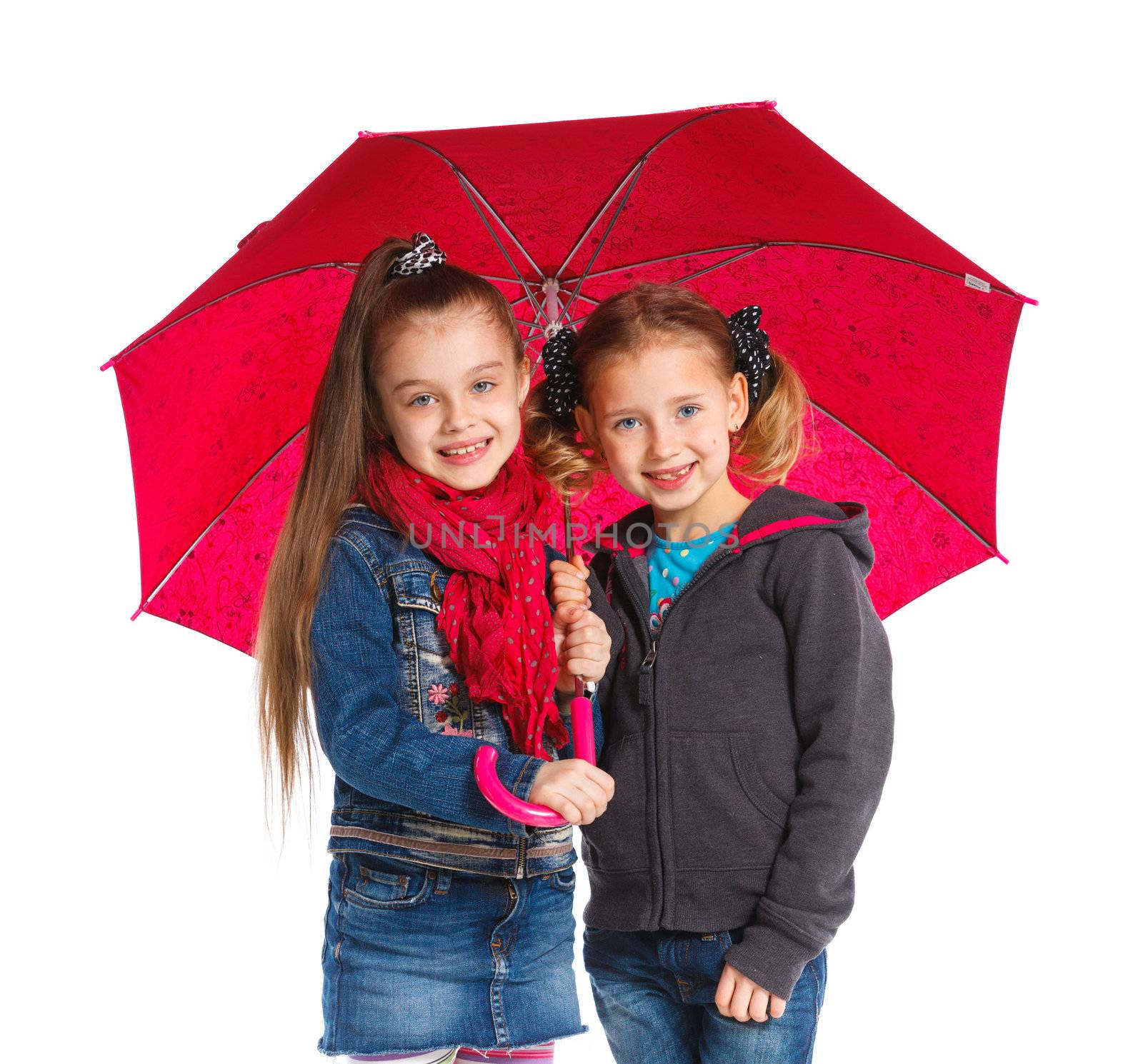 Two beautiful girls with umbrella. Isolated on white background