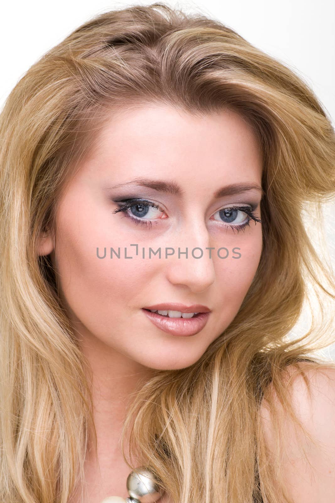 attractive young woman portrait closeup studio shot