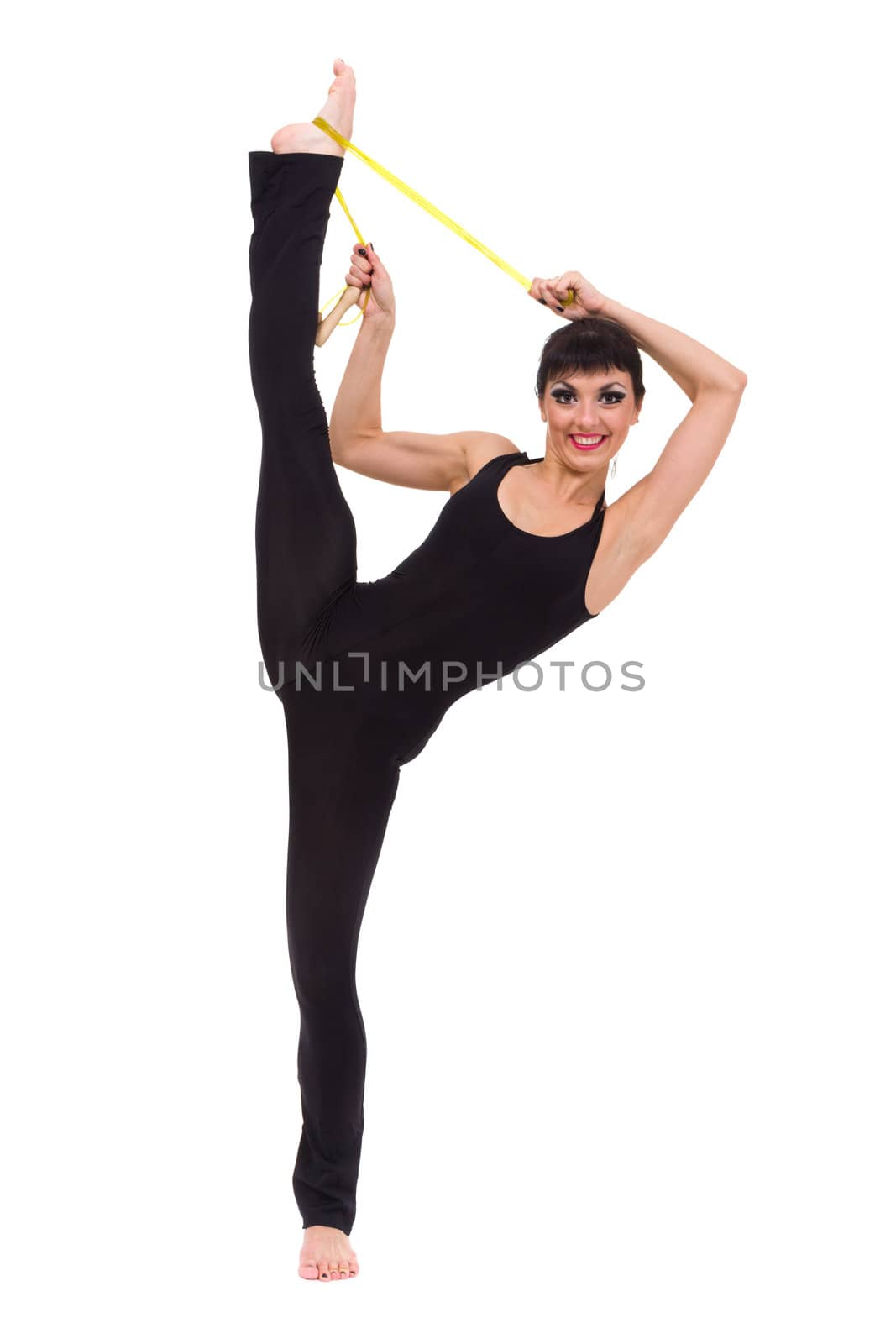 Smiling woman makes splits against isolated white background
