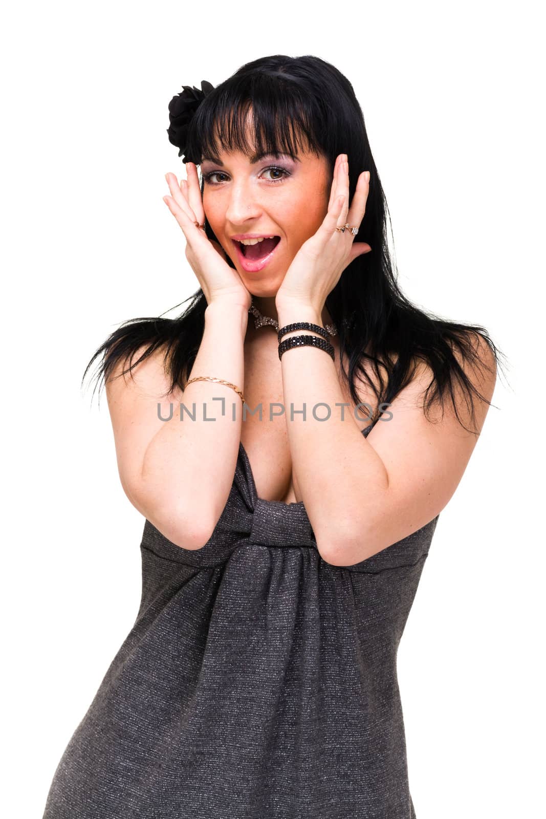 Surprised girl. Beautiful young woman closeup on white background.