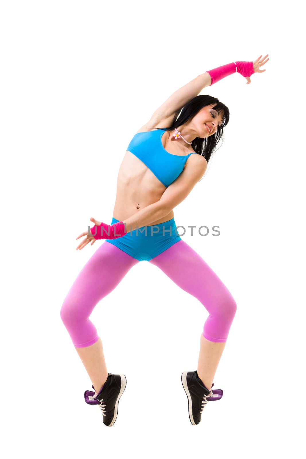 Gymnast woman dancing against isolated white background