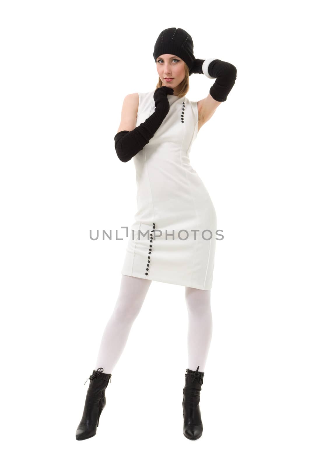 knitwear. young woman standing against isolated white background