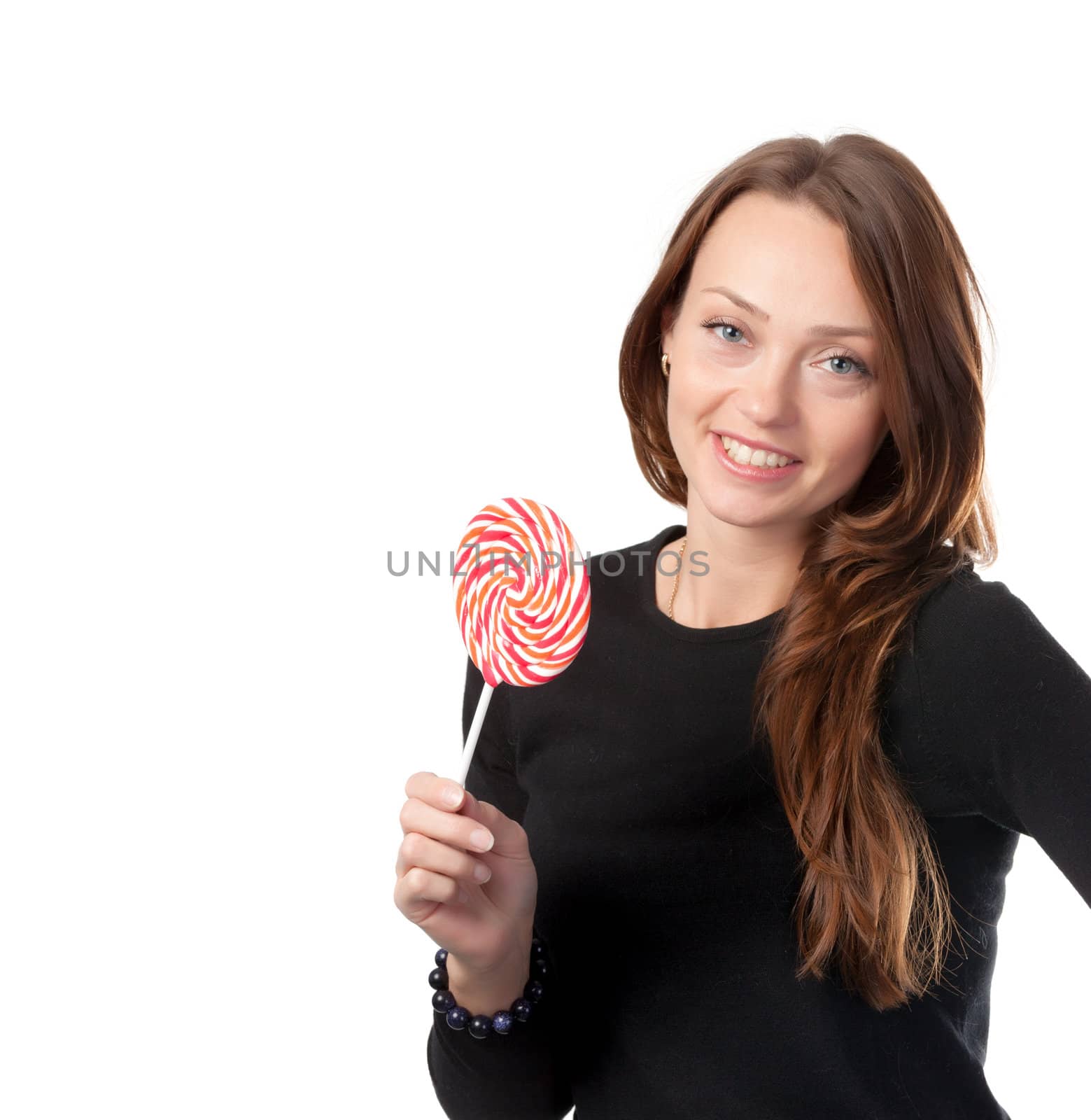 Studio shot of attractive smiling female with a lollipop isolated on white