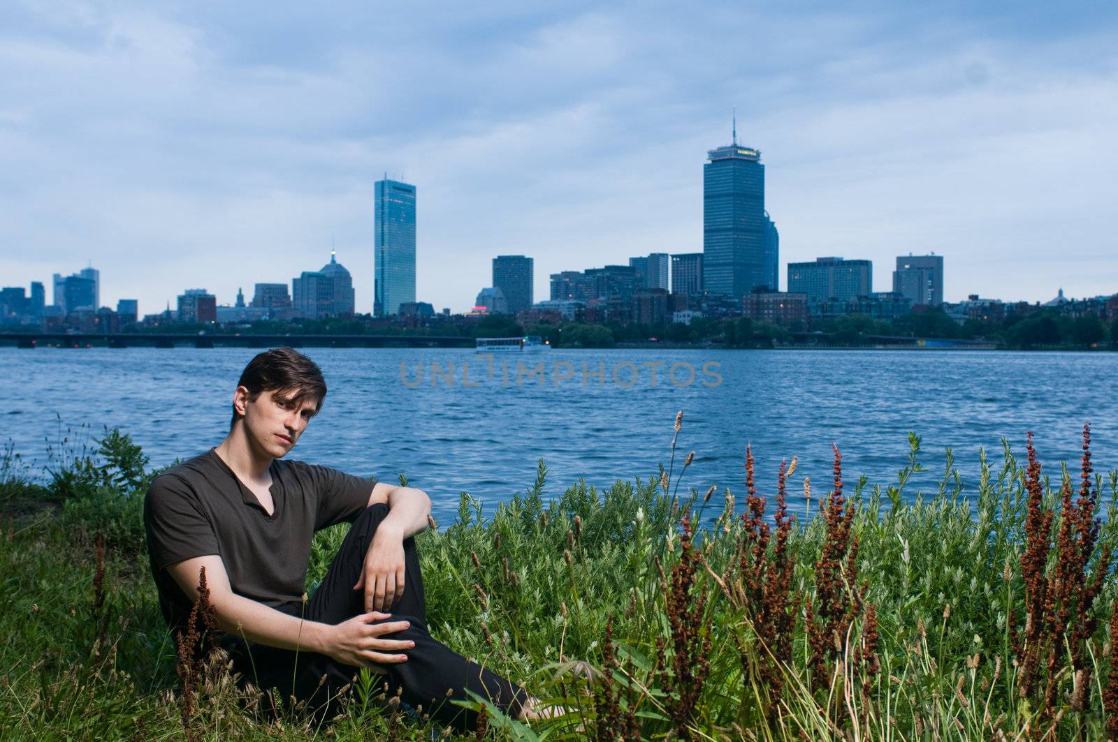 Young man at river by edan