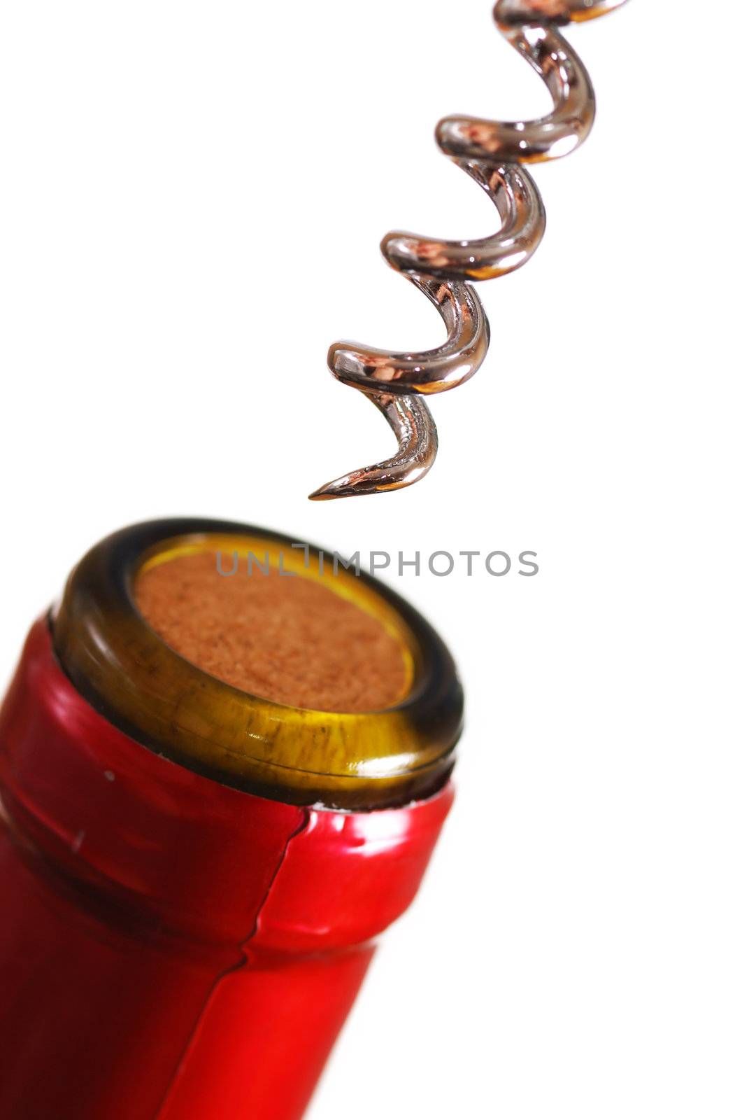Opening a wine bottle with corkscrew, isolated on white